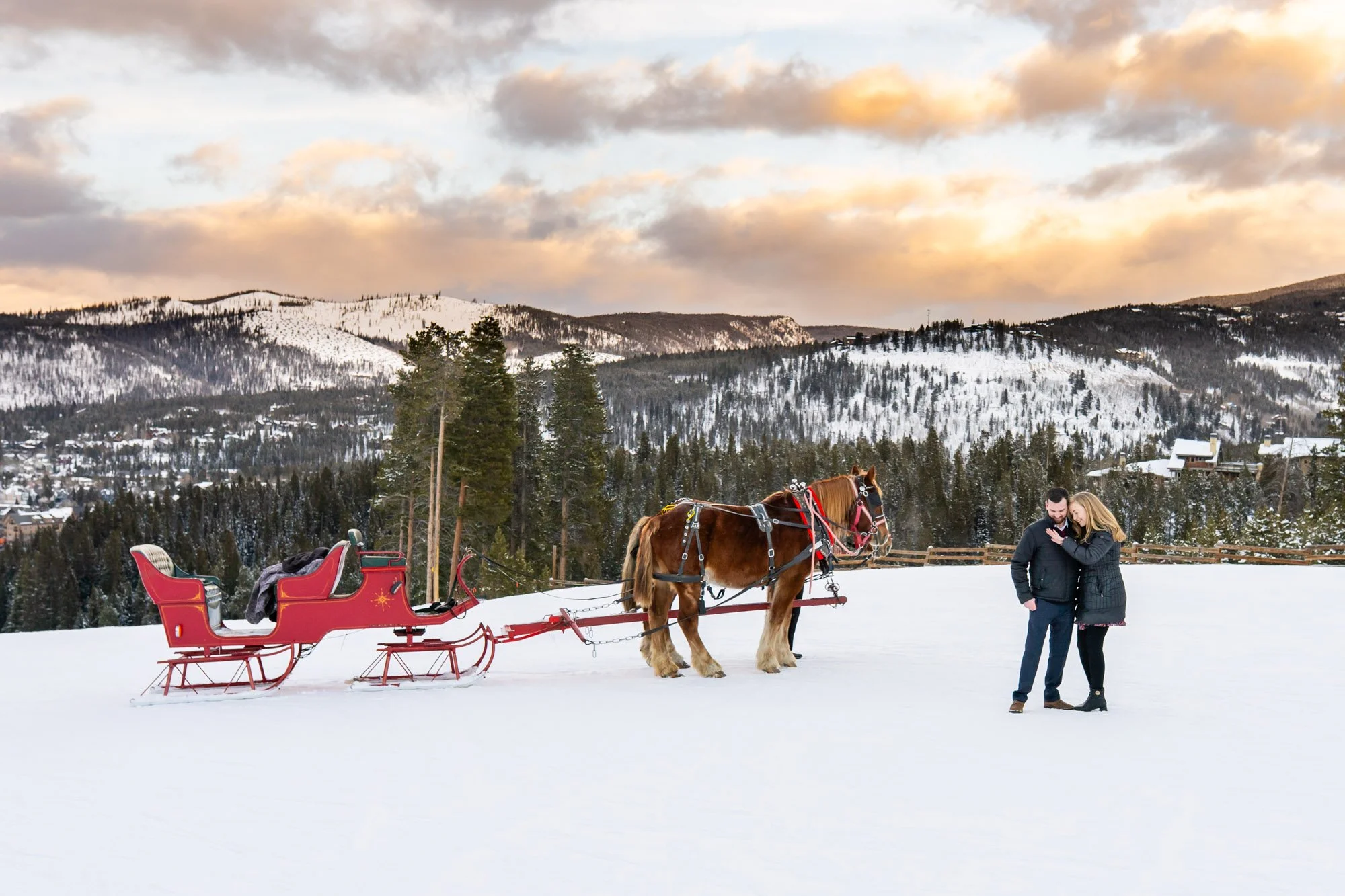 admiring-ring-sleigh-ride-proposal-breckenridge.jpg