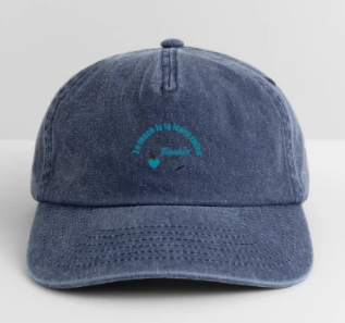 A blue denim baseball cap with with 'Teacher Life' design.