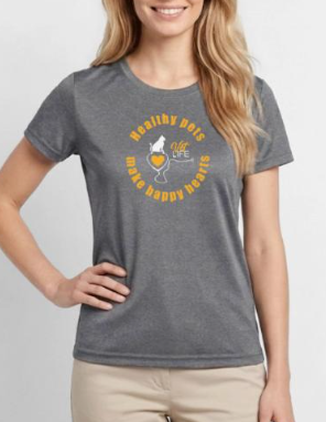 A woman wearing a gray T-shirt with a yellow design.