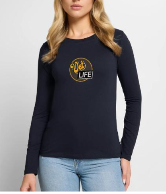 Woman wearing a navy long-sleeve shirt with a yellow design.