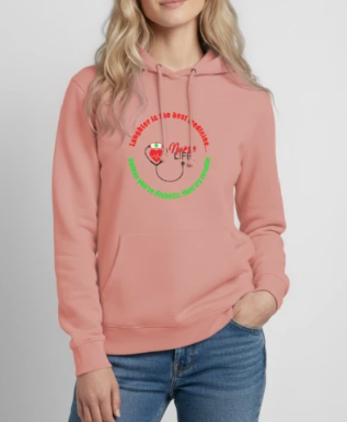A woman wearing a pink hoodie with with a 'Nurse Life' design.