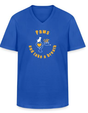 Blue V-neck T-shirt with a graphic of a dog, a heart, and the text 'Paws and take a breath' in yellow.