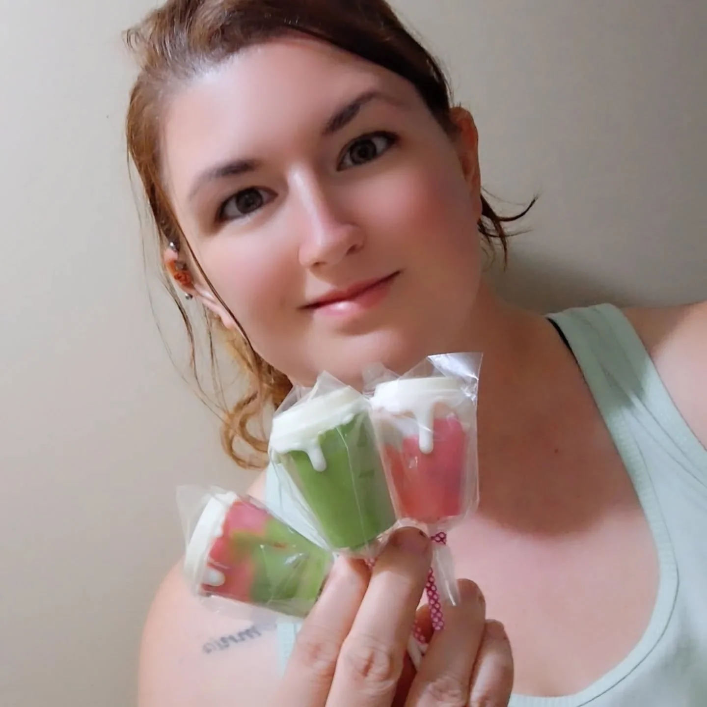Woman holding cake pops