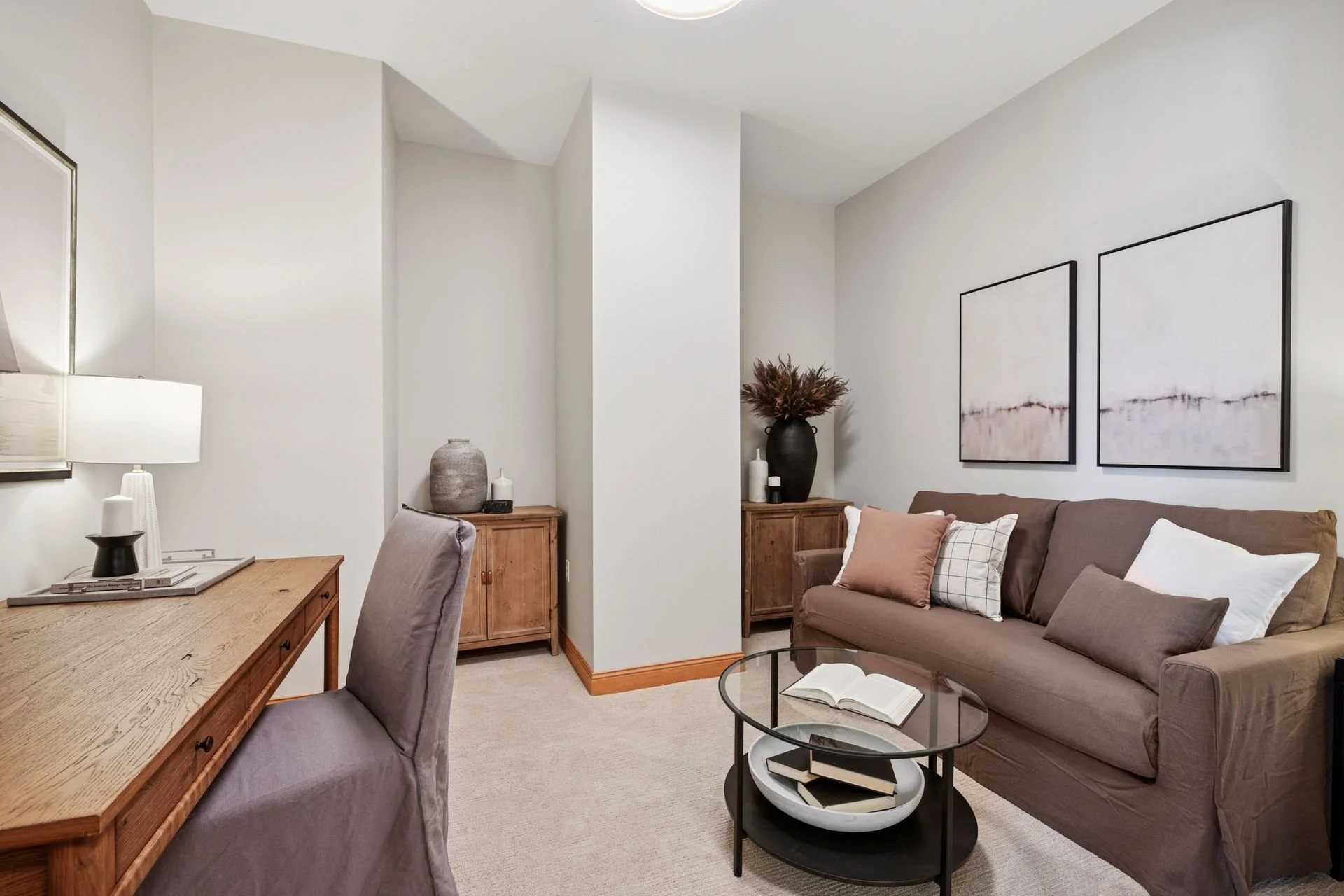 Living room with beige carpet.