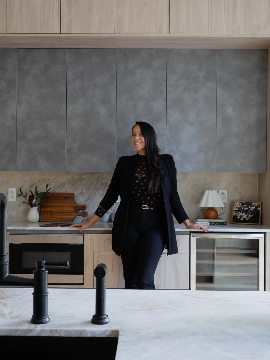 Lead Photographer Kat portrait in modern kitchen