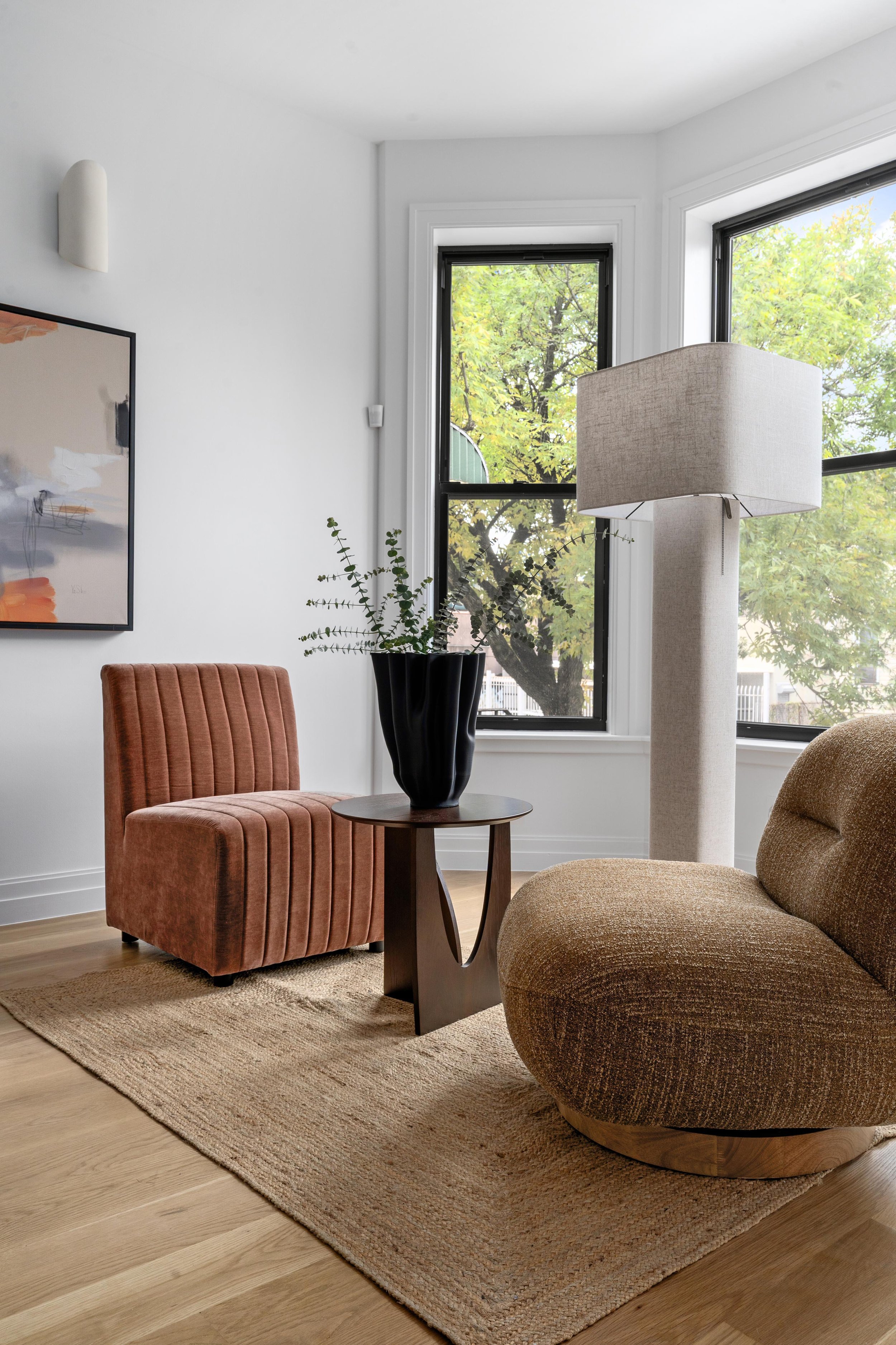 sun drenched window nook with cozy plush chairs