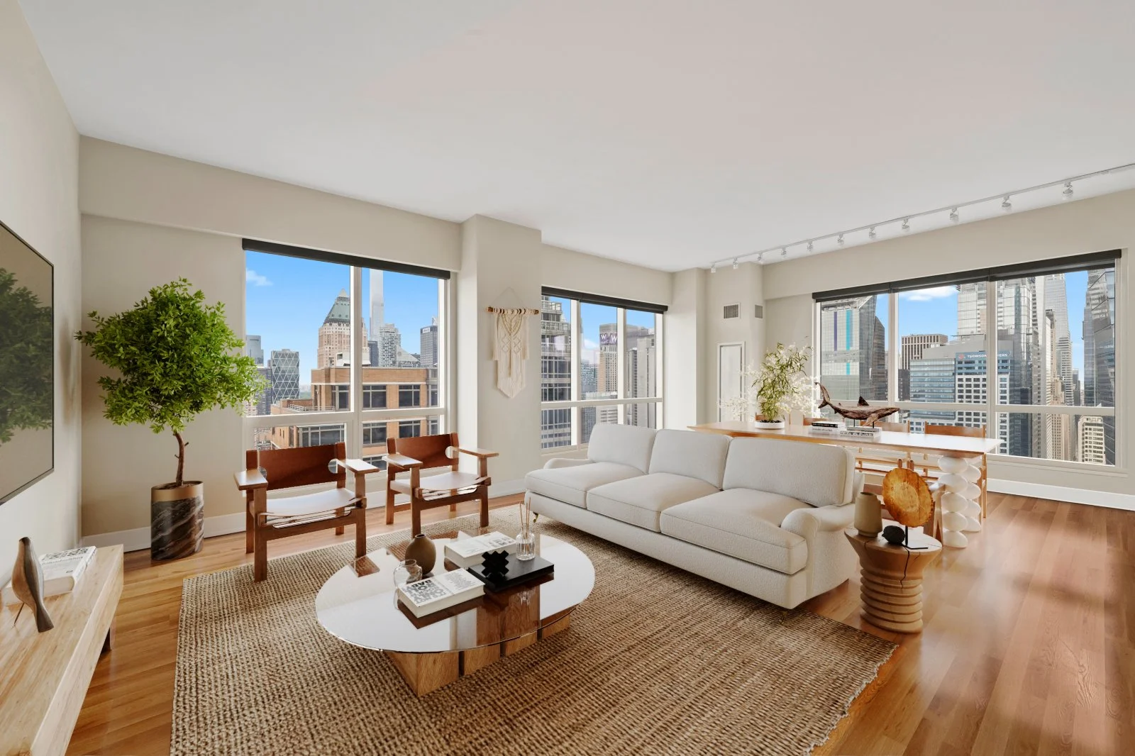 warm neutral decor in living area with view of the city