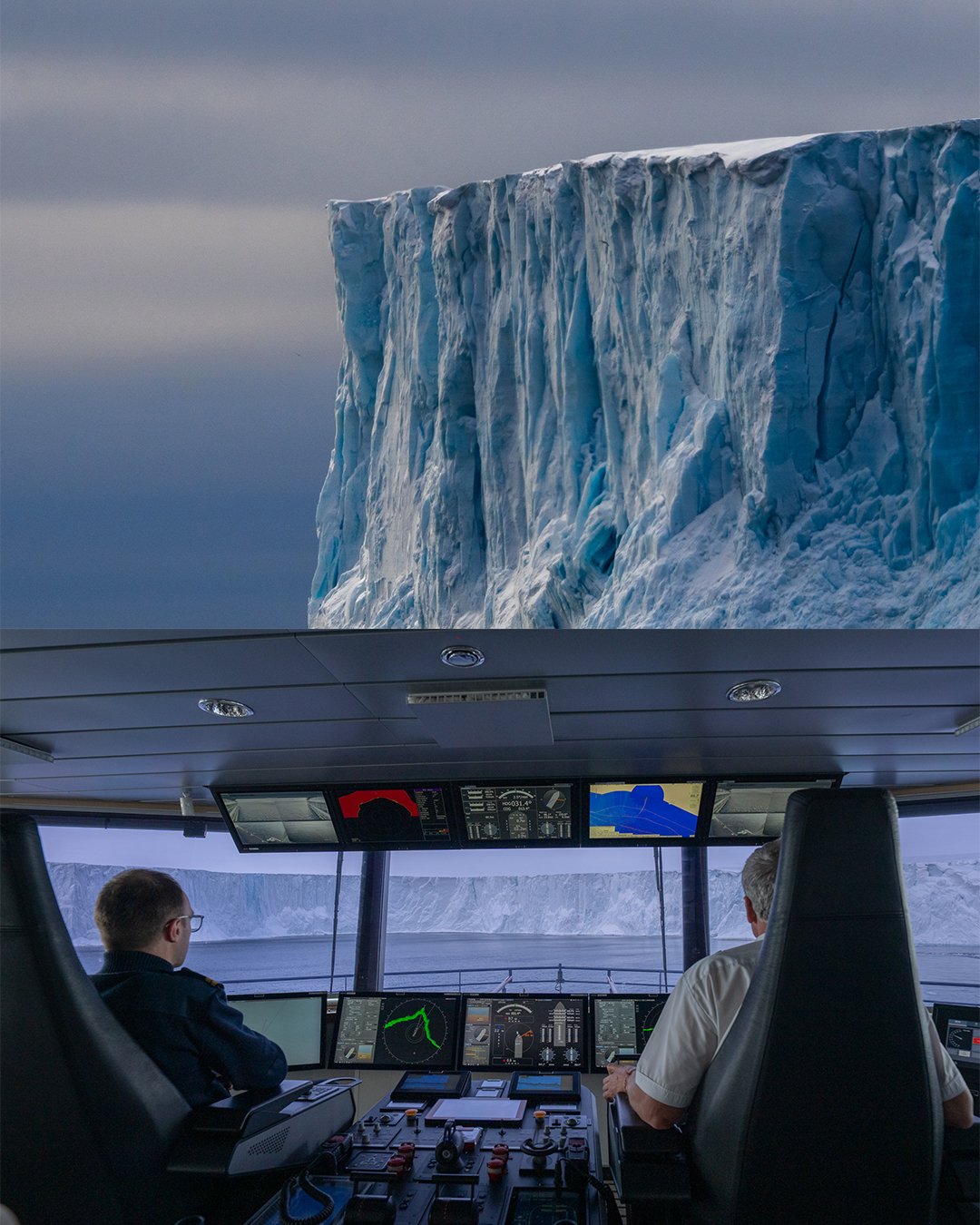 Inside a National Geographic Linblad ship's bridge with two people operating controls, viewing a large ice glacier through the windows, and a large ice glacier outside.