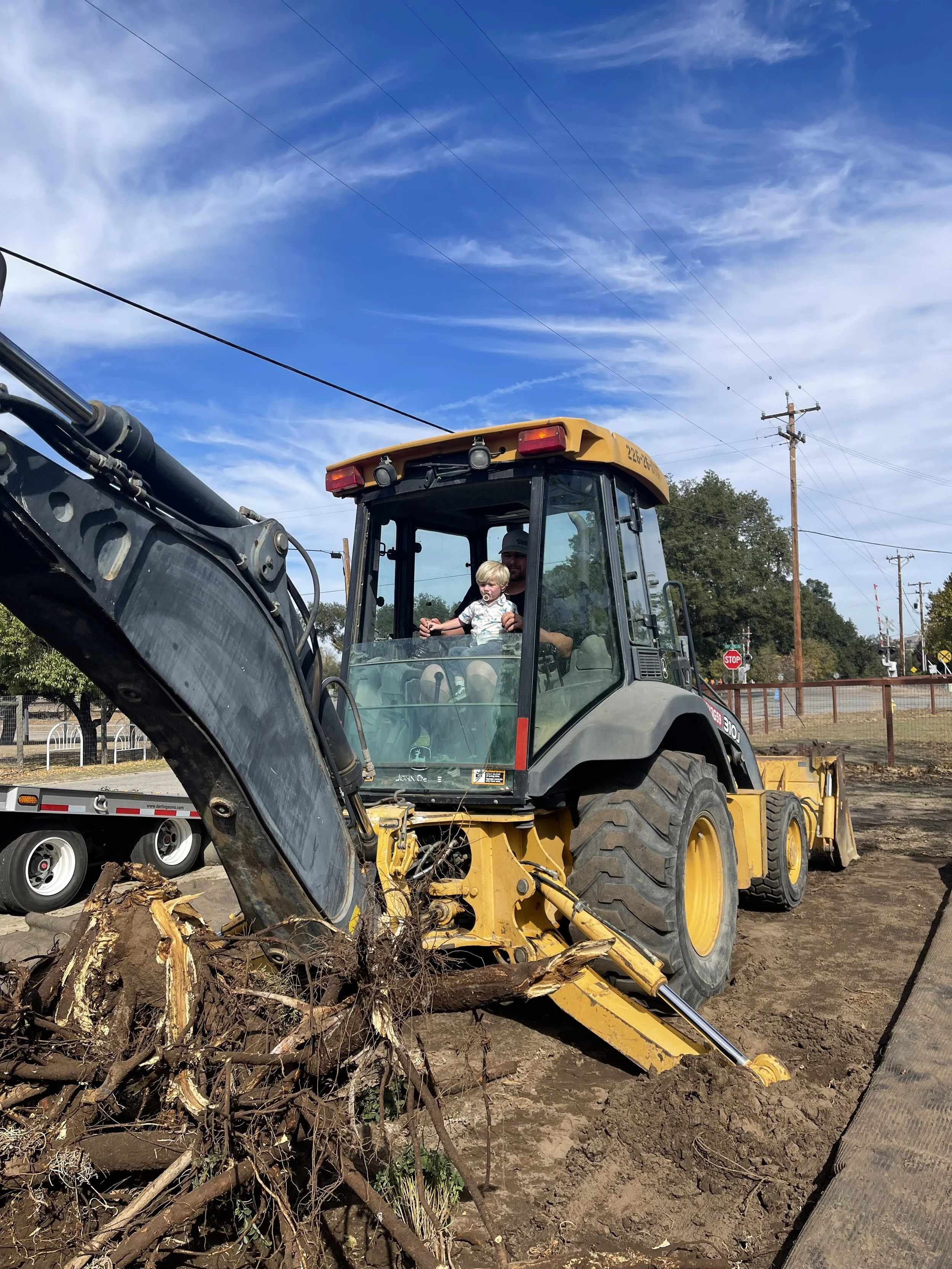 Holloway Earthwork providing backhoe services for trenching, digging, and site preparation in Paso Robles
