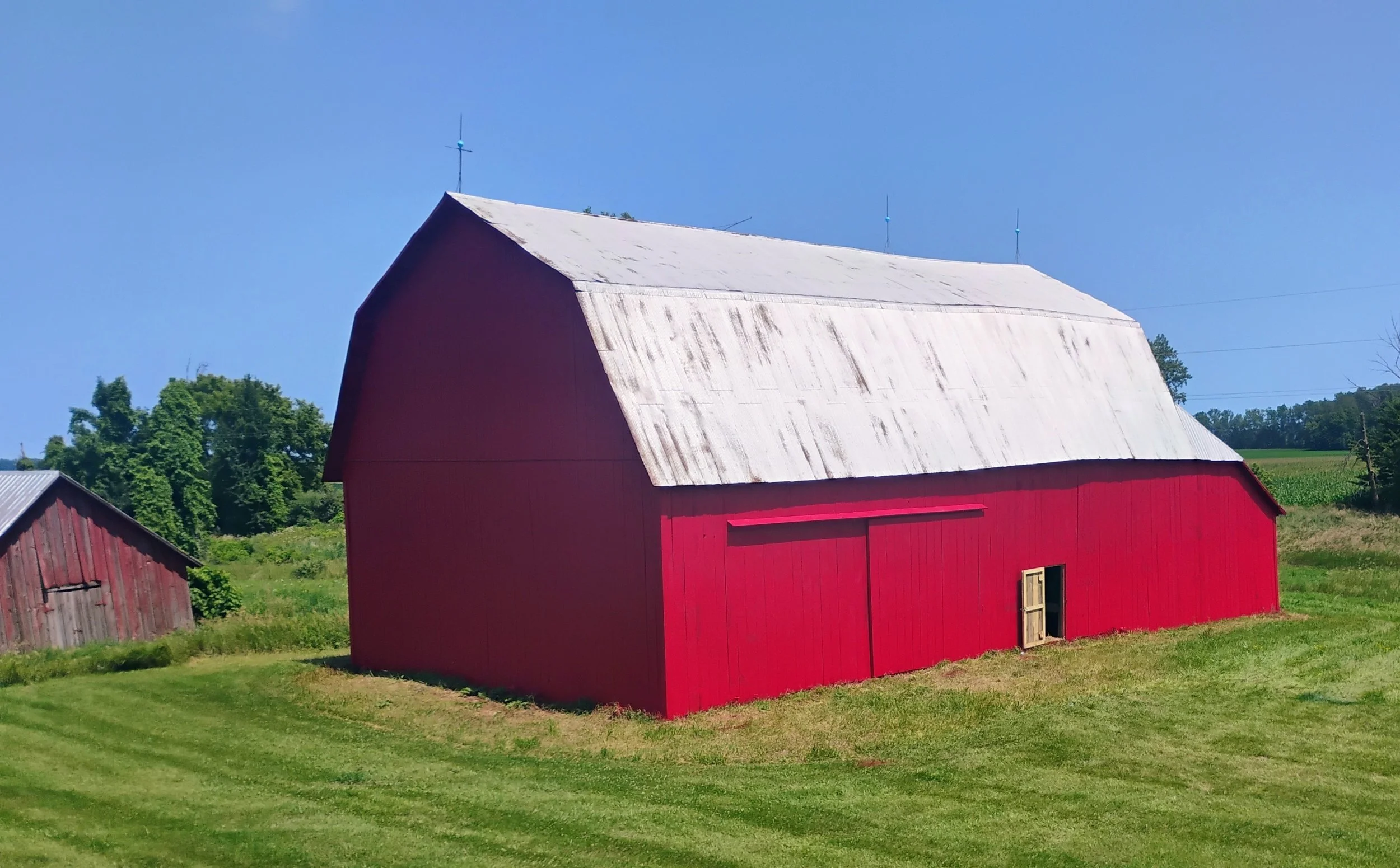 Large barn after painting completed.