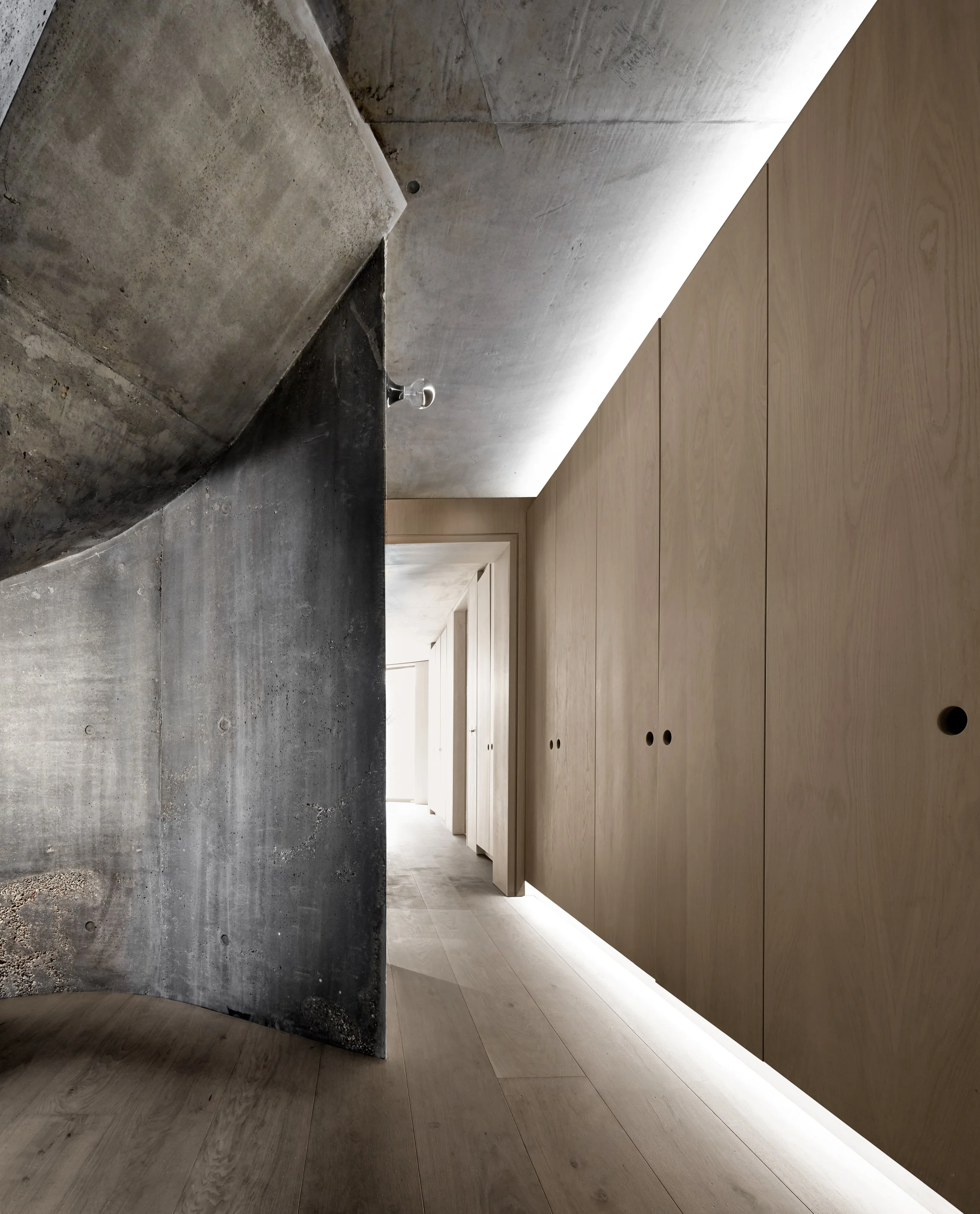 Internal exposed concrete and bespoke joinery