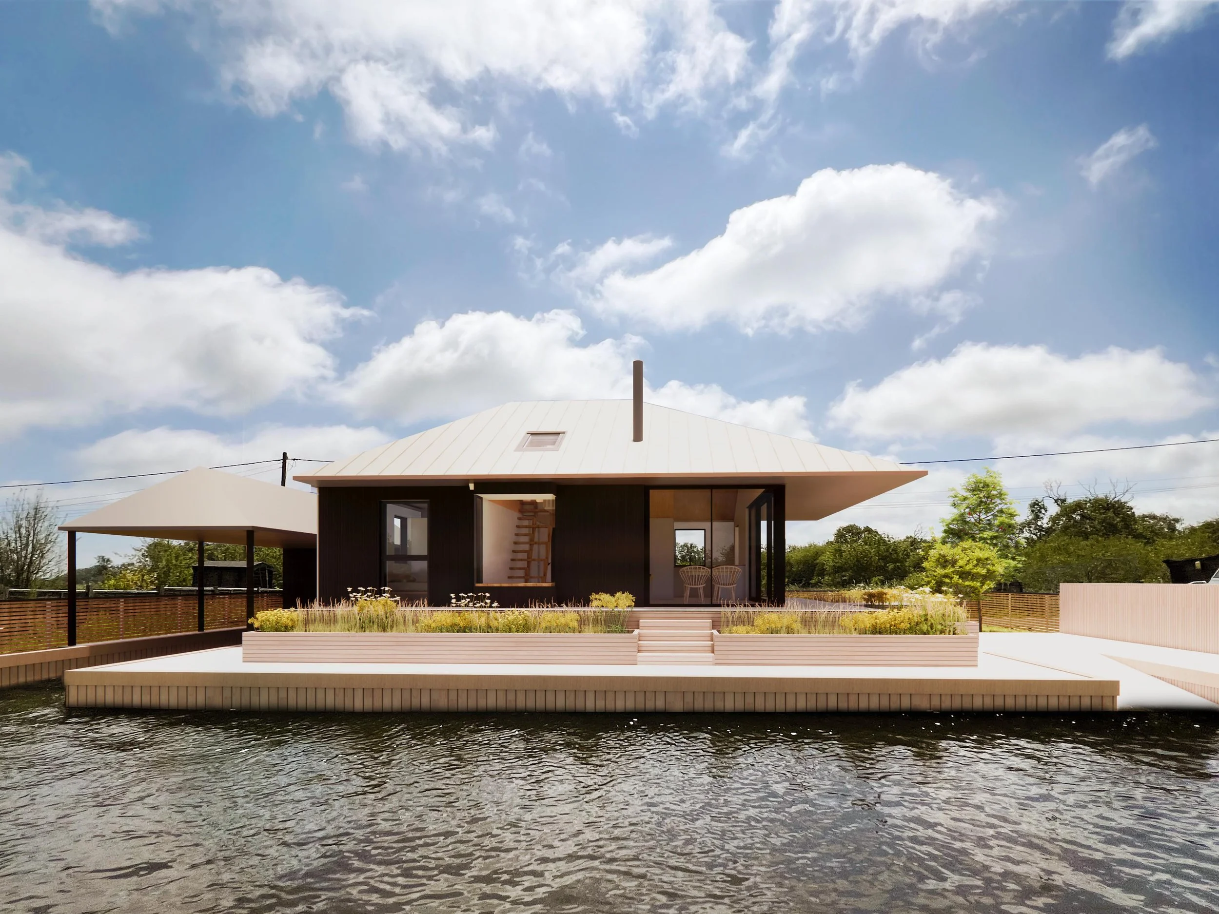 Modern house on a waterfront with a deck and steps leading down to the water, under a blue sky with scattered clouds.