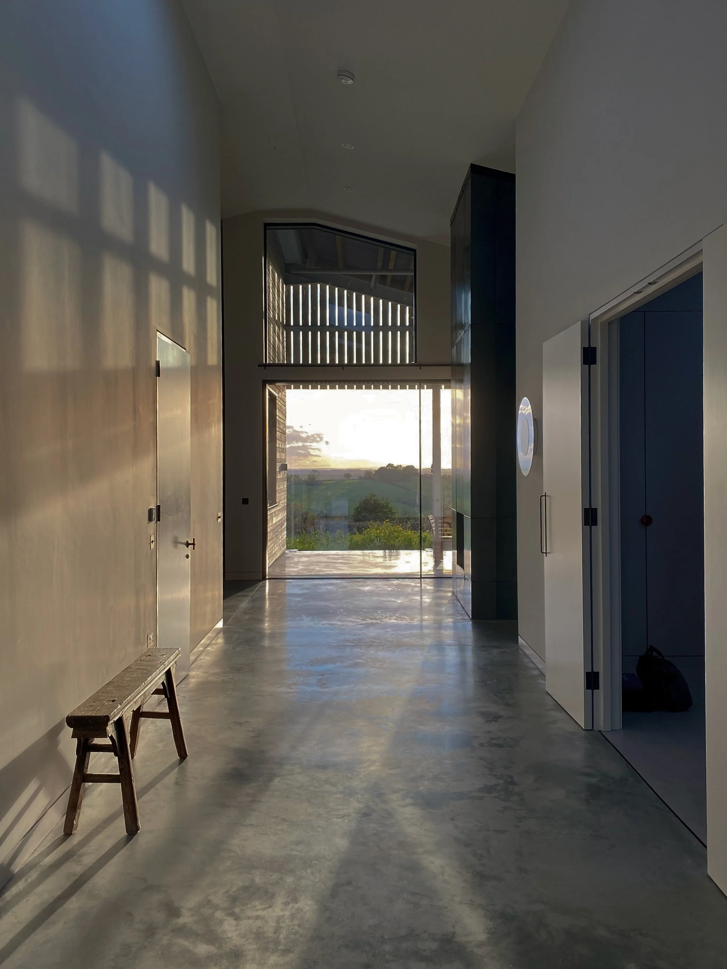 Internal corridor and view across fields barn conversion