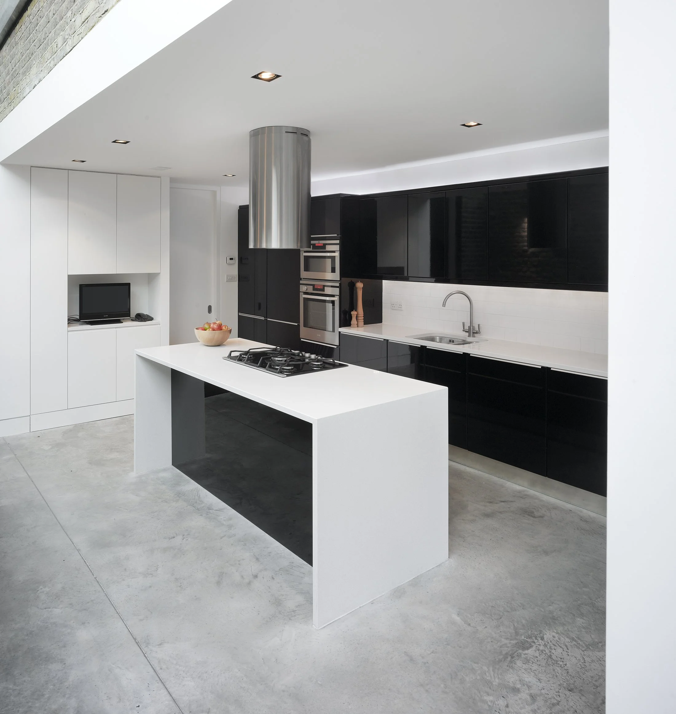 Black and white kitchen at Mapledene Road London