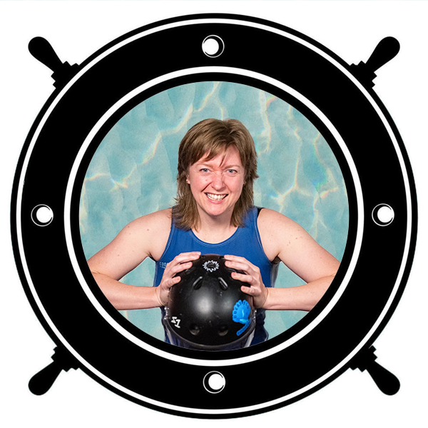 Young woman shouting with fists clenched, wearing a blue shirt and bandana, seen through a circular porthole. 
