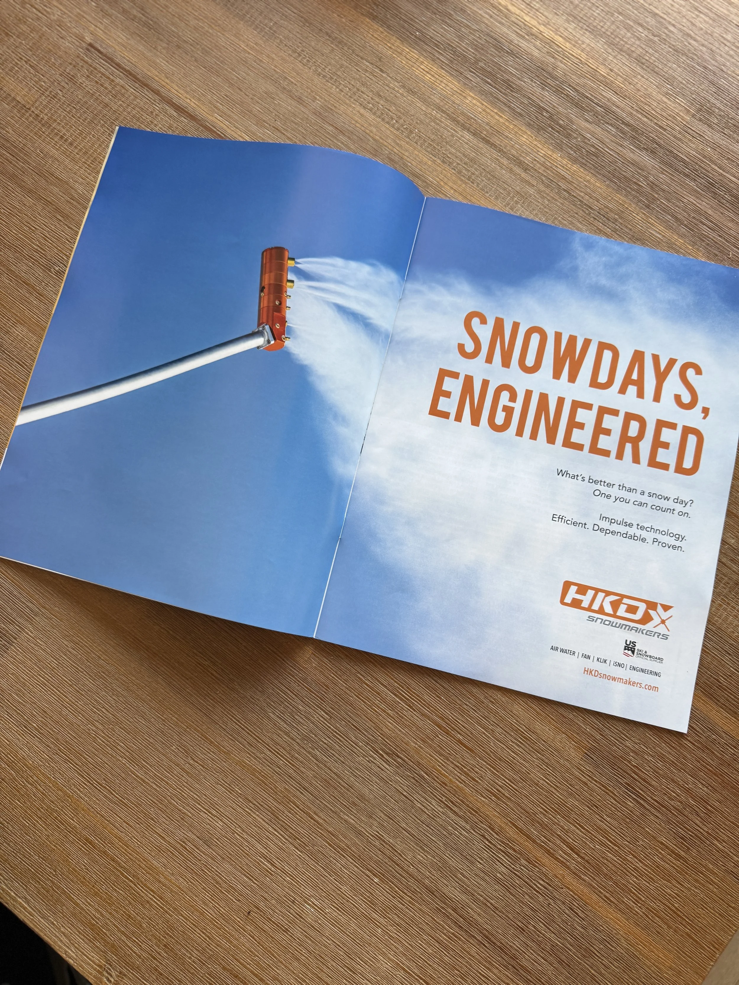 SAM Magazine double page spread ad