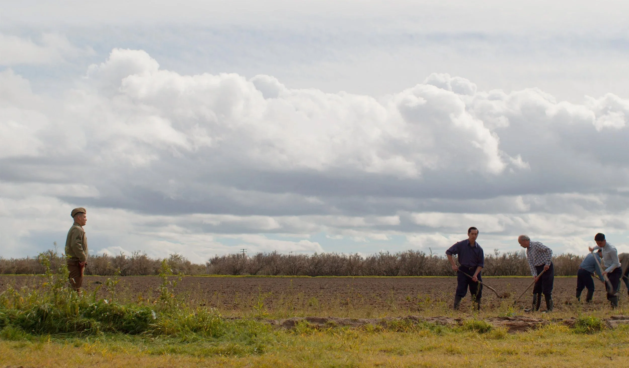 Yoshi is arrested after refusing the draft while his family is unjustly imprisoned.