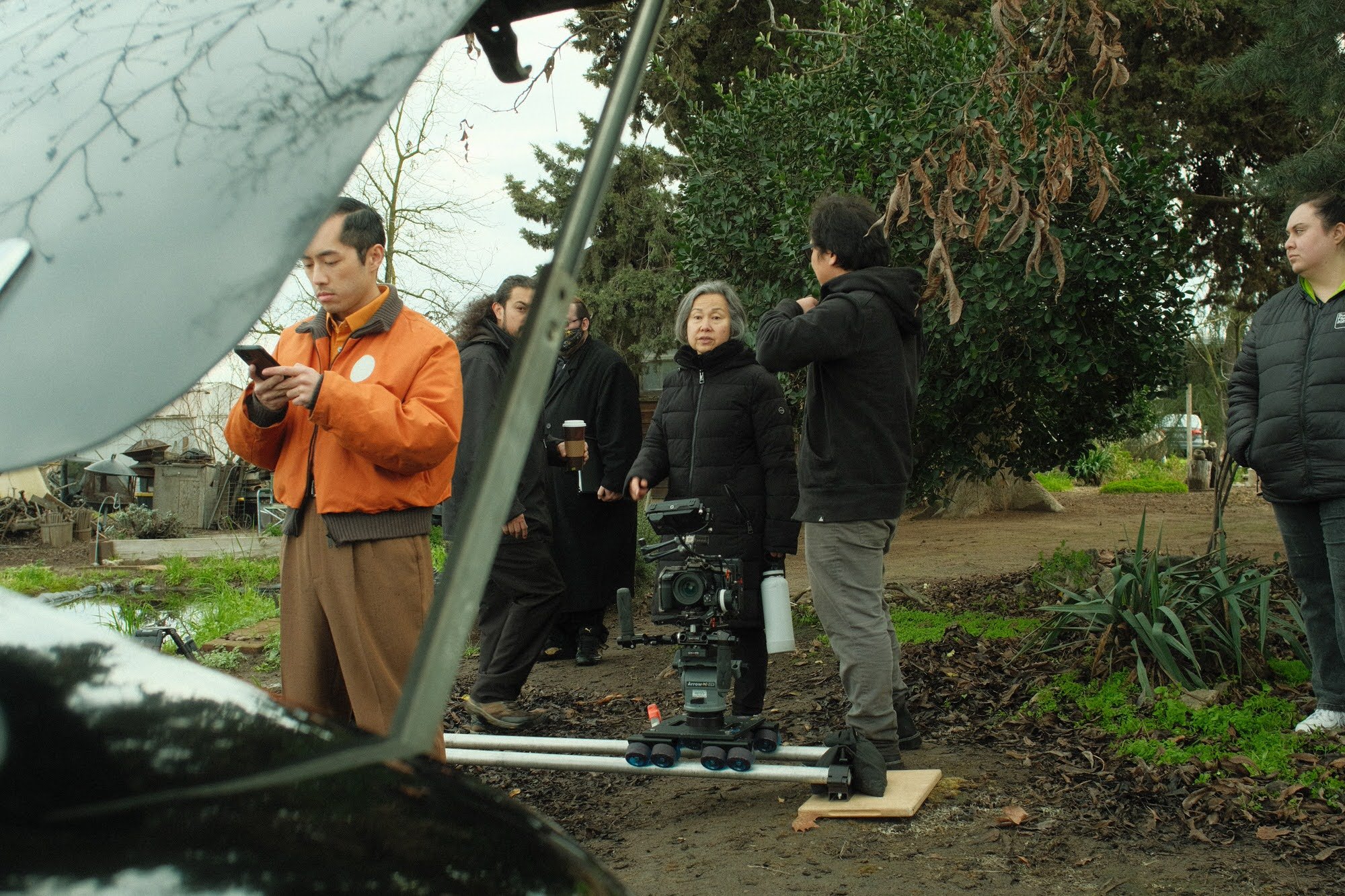 Director Karina Ezitis confers with Cinematographer Jason Wada. 