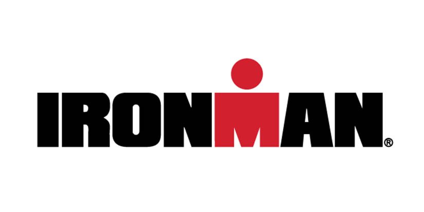 The Ironman logo with the word 'IRONMAN' in black letters and a red circle above the 'M' representing a person.