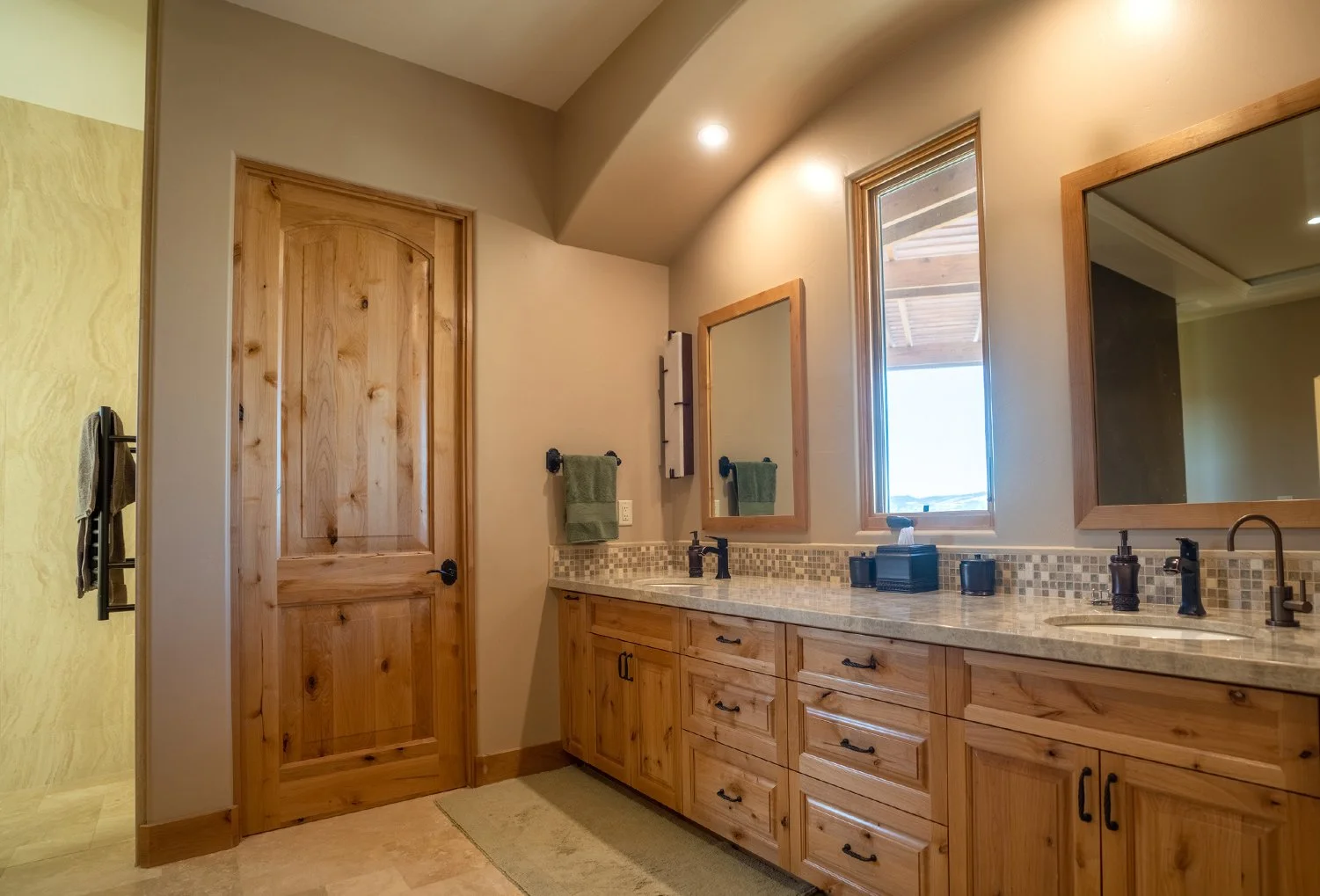 607a1153092771d21687ccf4_ORMONDE_CONSTRUCTION_CUSTOM_HOMES_CENTRAL_COAST_TUSCAN_BATHROOM_2.jpg