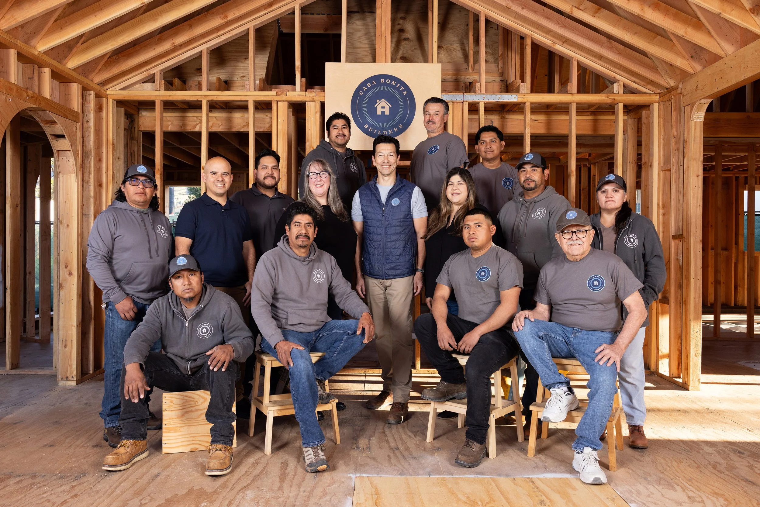 Casa Bonita Builders construction team inside a wood framed home in Pasadena, highlighting residential framing, craftsmanship, and collaborative build process.