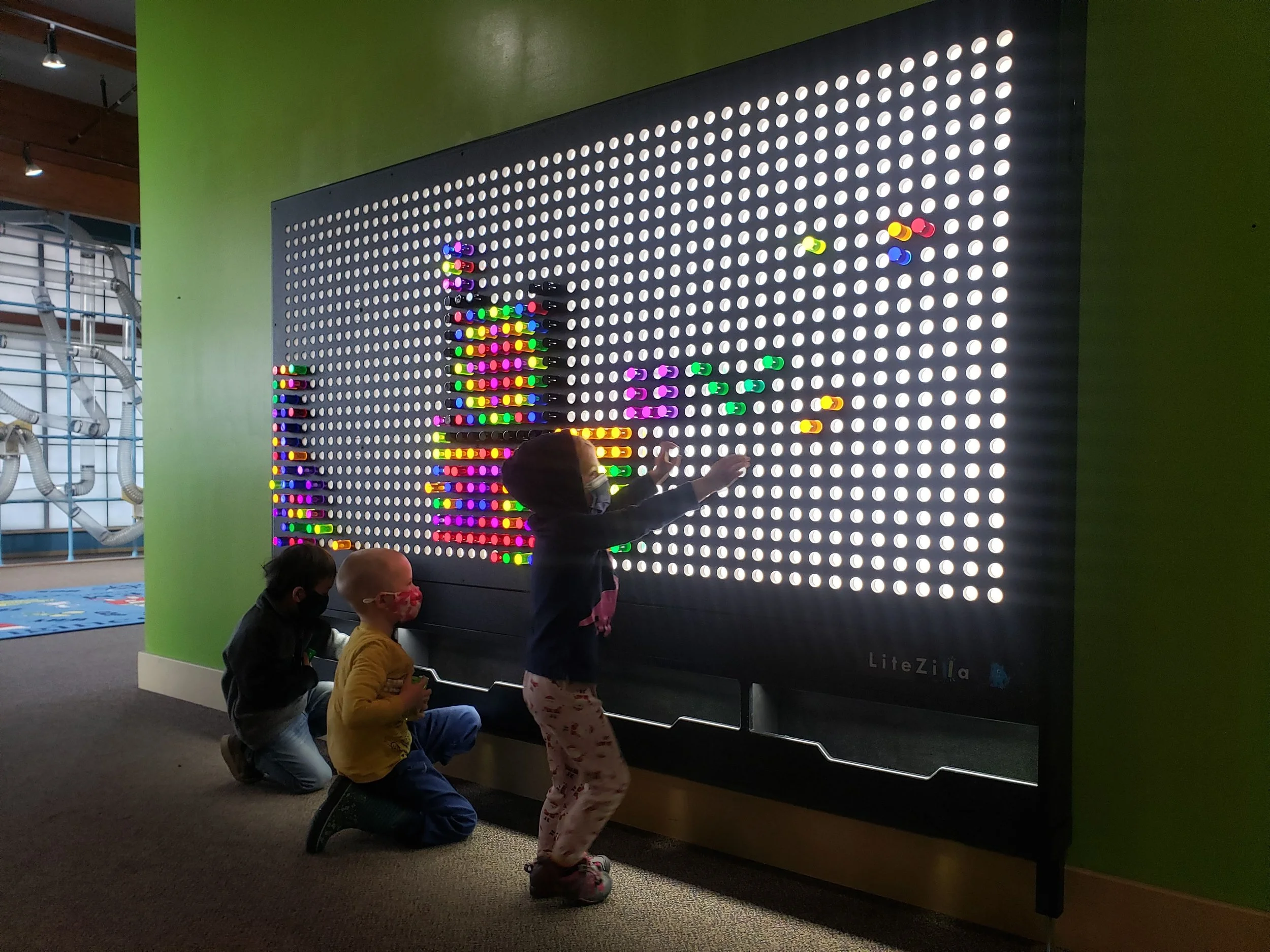 1.	children exploring hands-on exhibits at ExplorationWorks in Helena MT