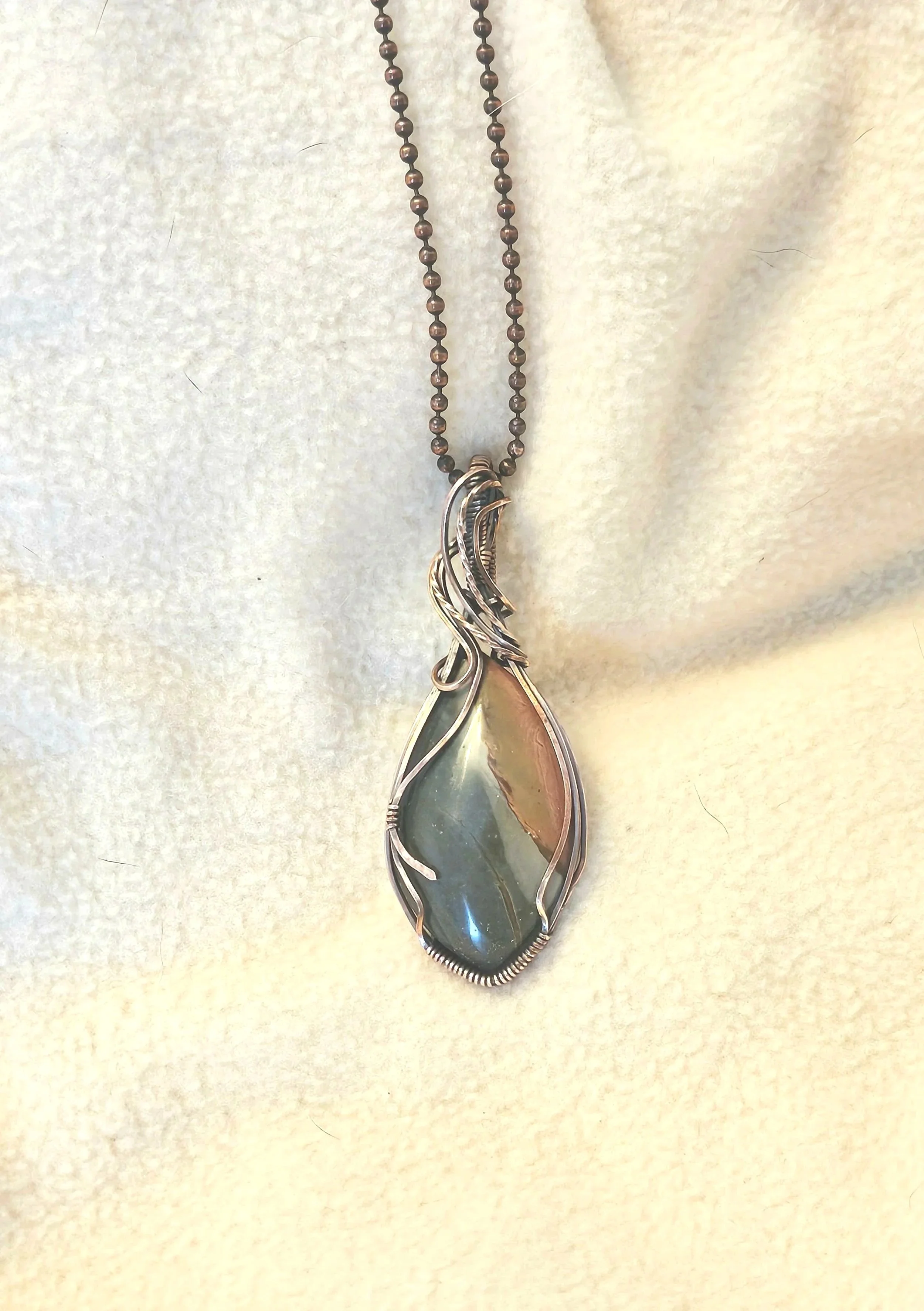 Polychrome Jasper wrapped in copper