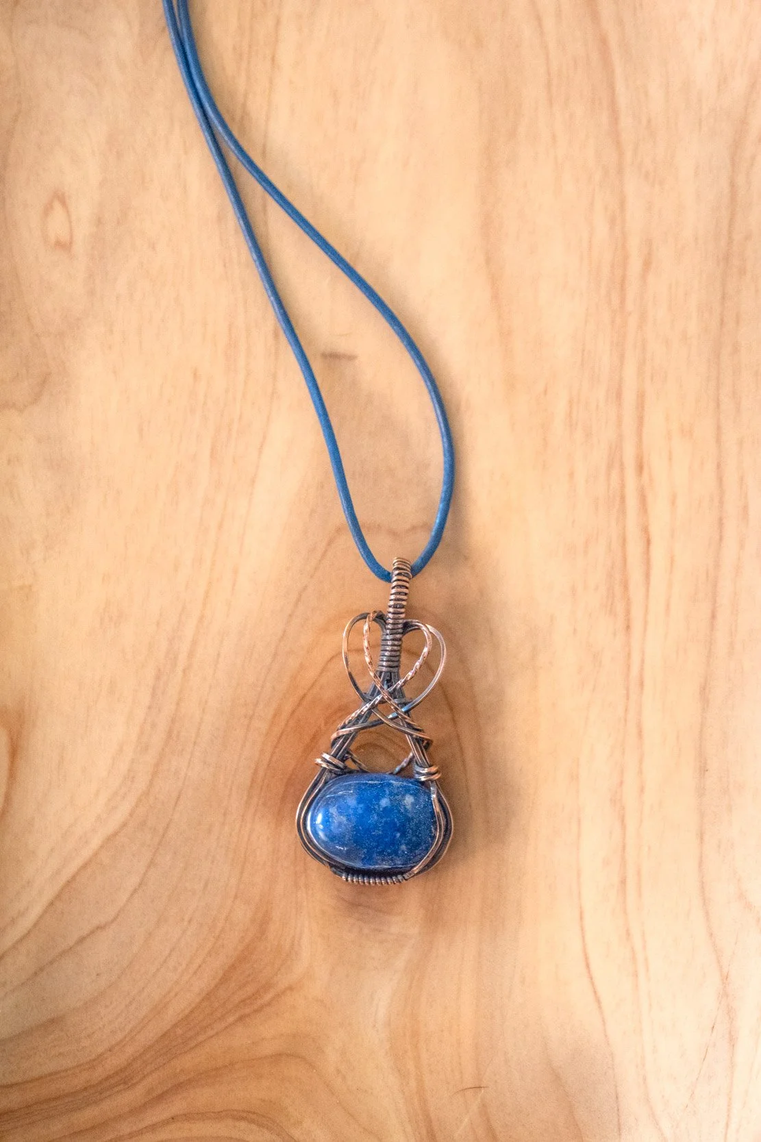 Lapis Lazuli wrapped in raw copper & oxidized