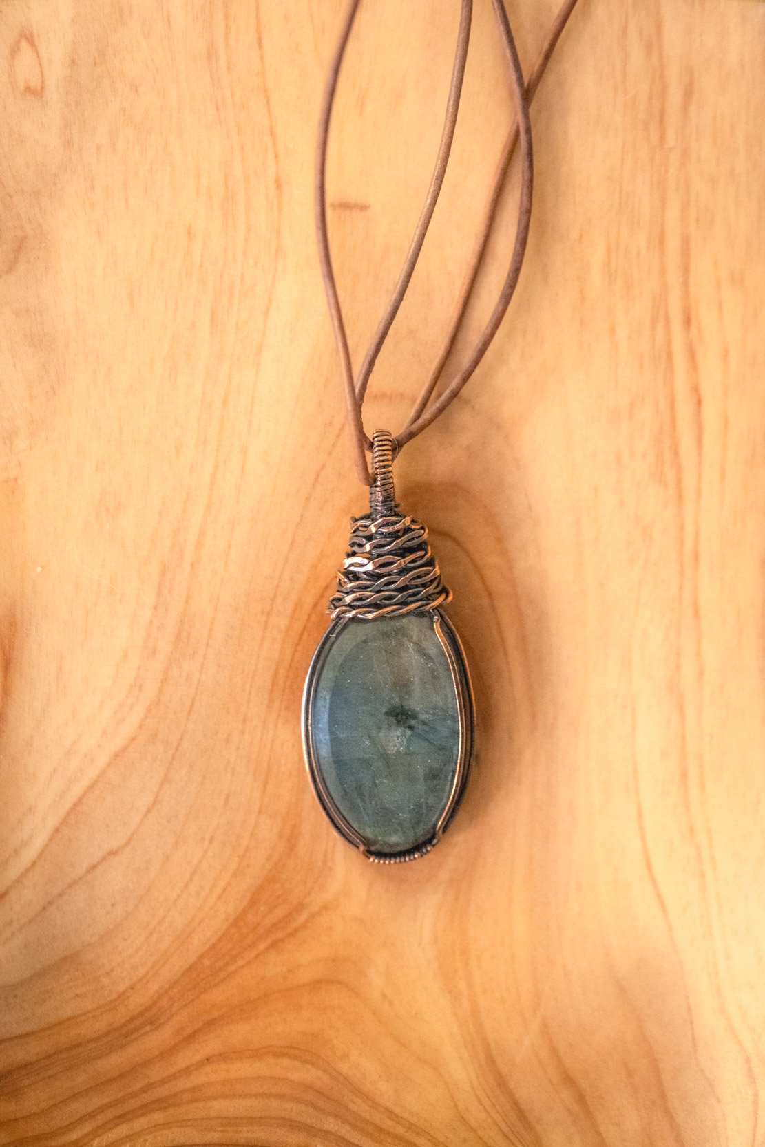Labradorite wrapped in raw copper & oxidized