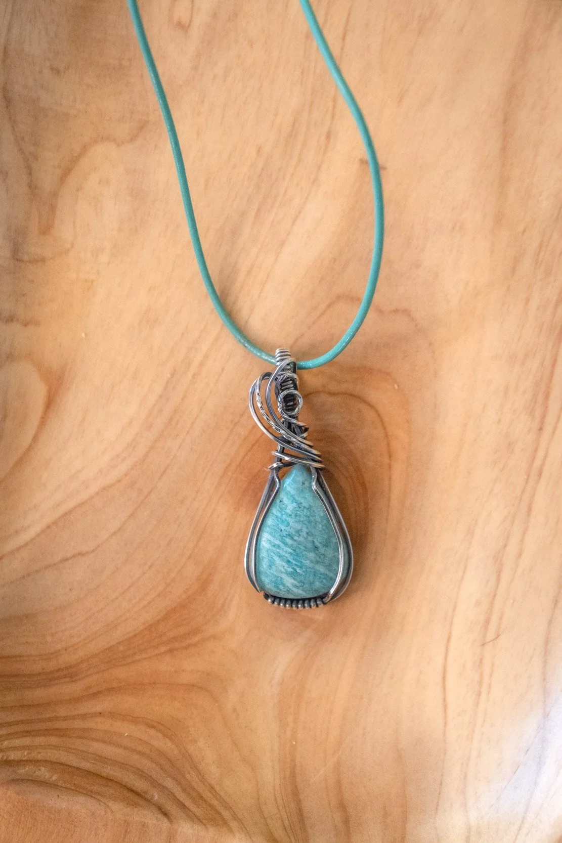 Amazonite wrapped in sterling silver & oxidized