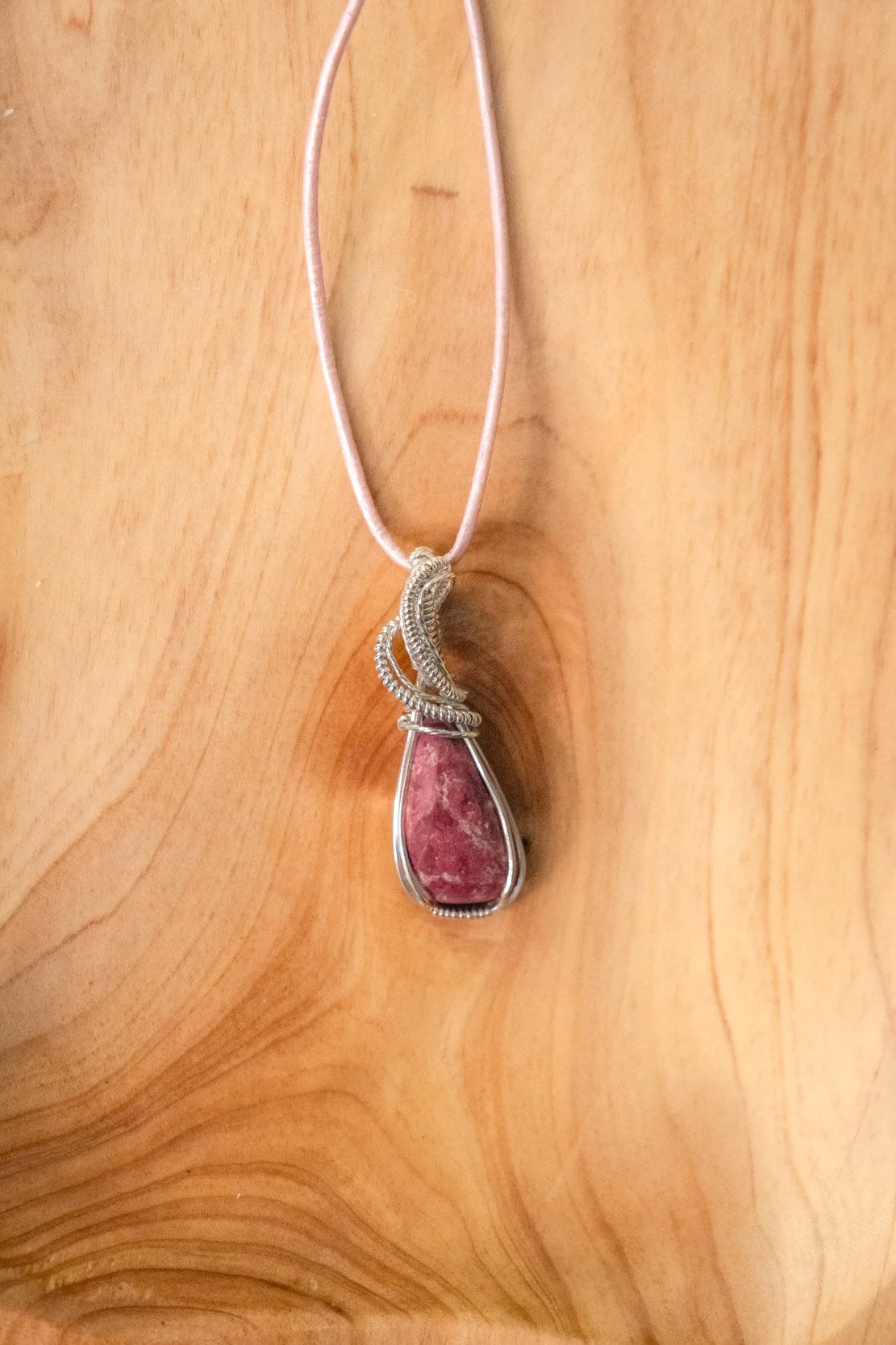 Thulite, wrapped in sterling silver