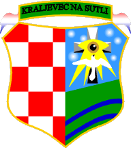 A colorful coat of arms featuring a red and white checkerboard pattern, a yellow star-like figure with a face, a blue and green landscape, and a banner with the text 'Kraljevac na Sutli'.