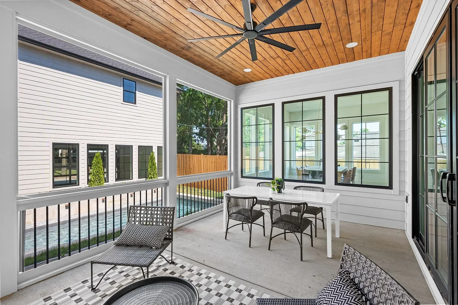 screened in back porch overlooking the pool installed