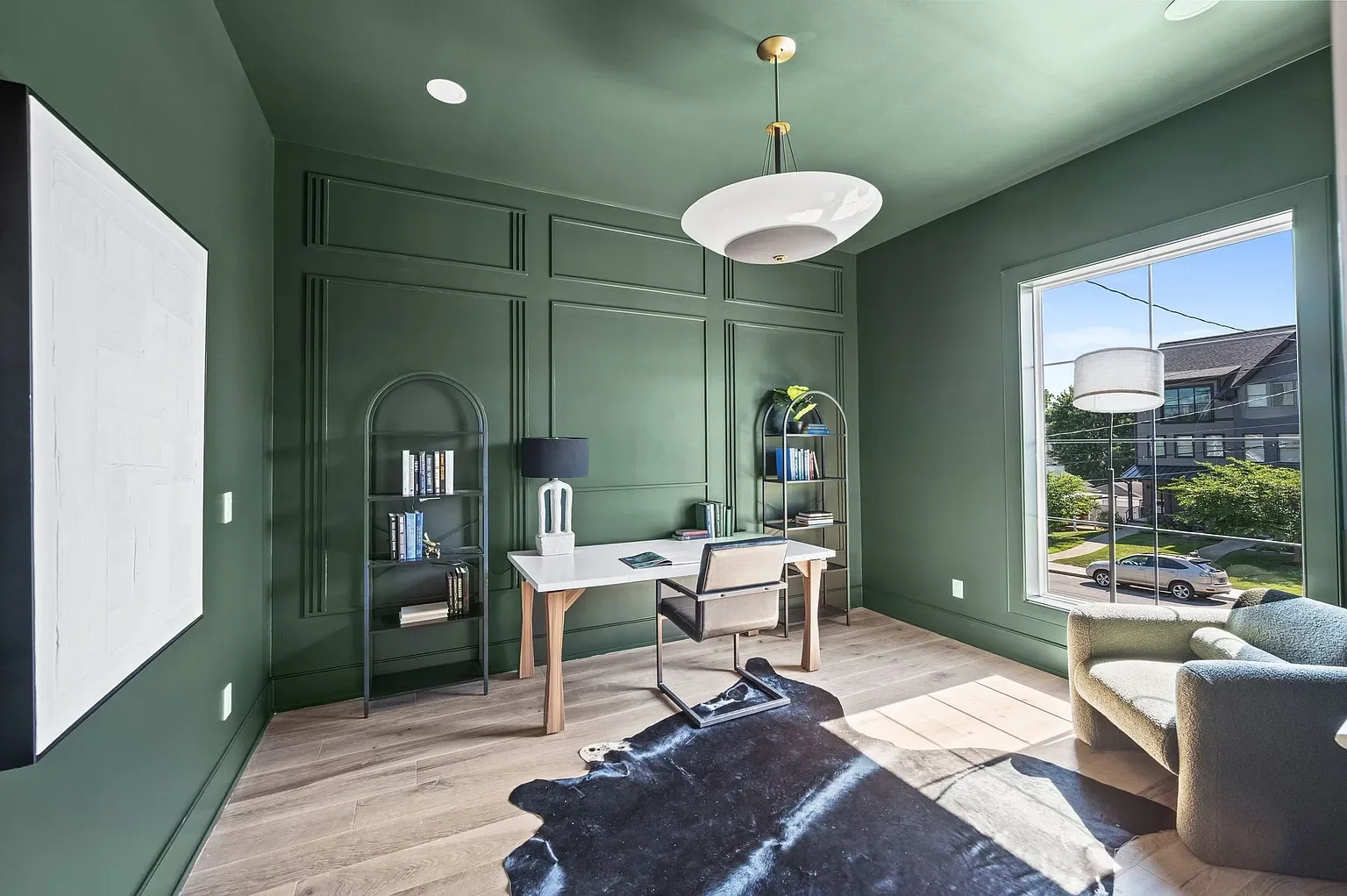 Gorgeous green office with custom trim accent walls