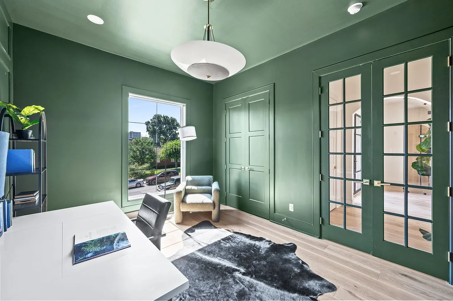 Green office with double glass door entrance 