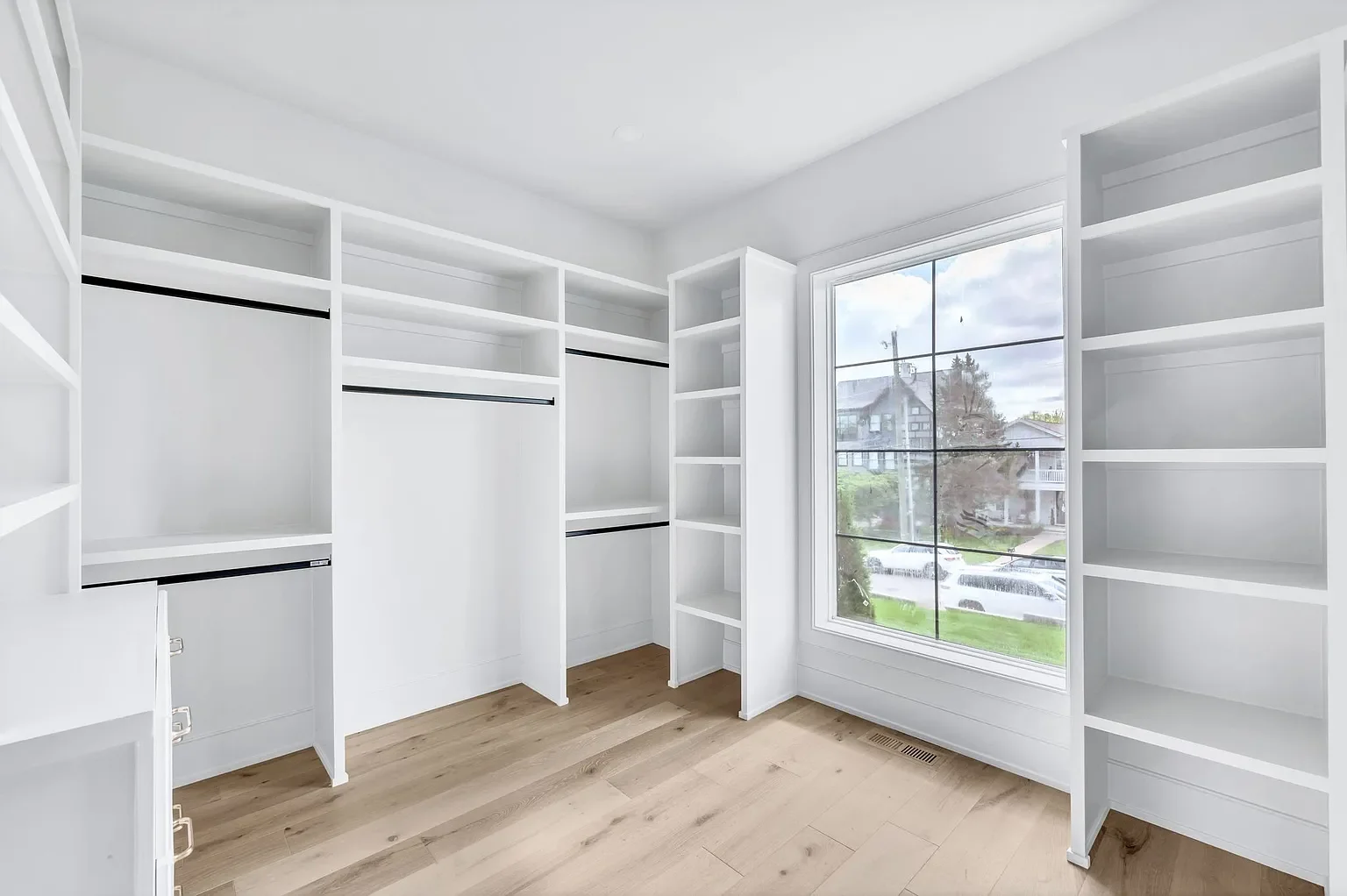 Her primary custom closet carpentry