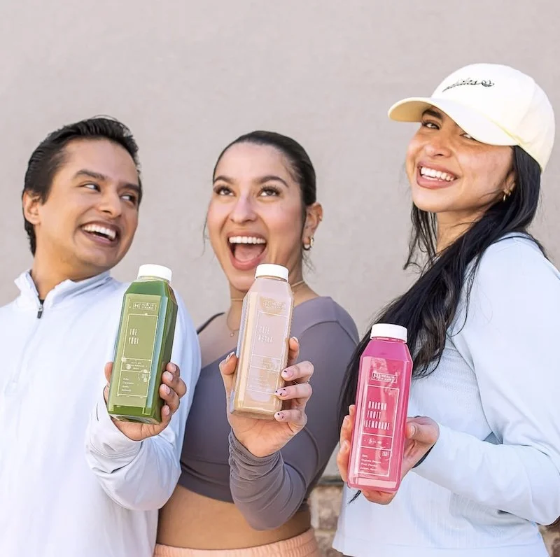 people holding juices and smoothies from health in hand