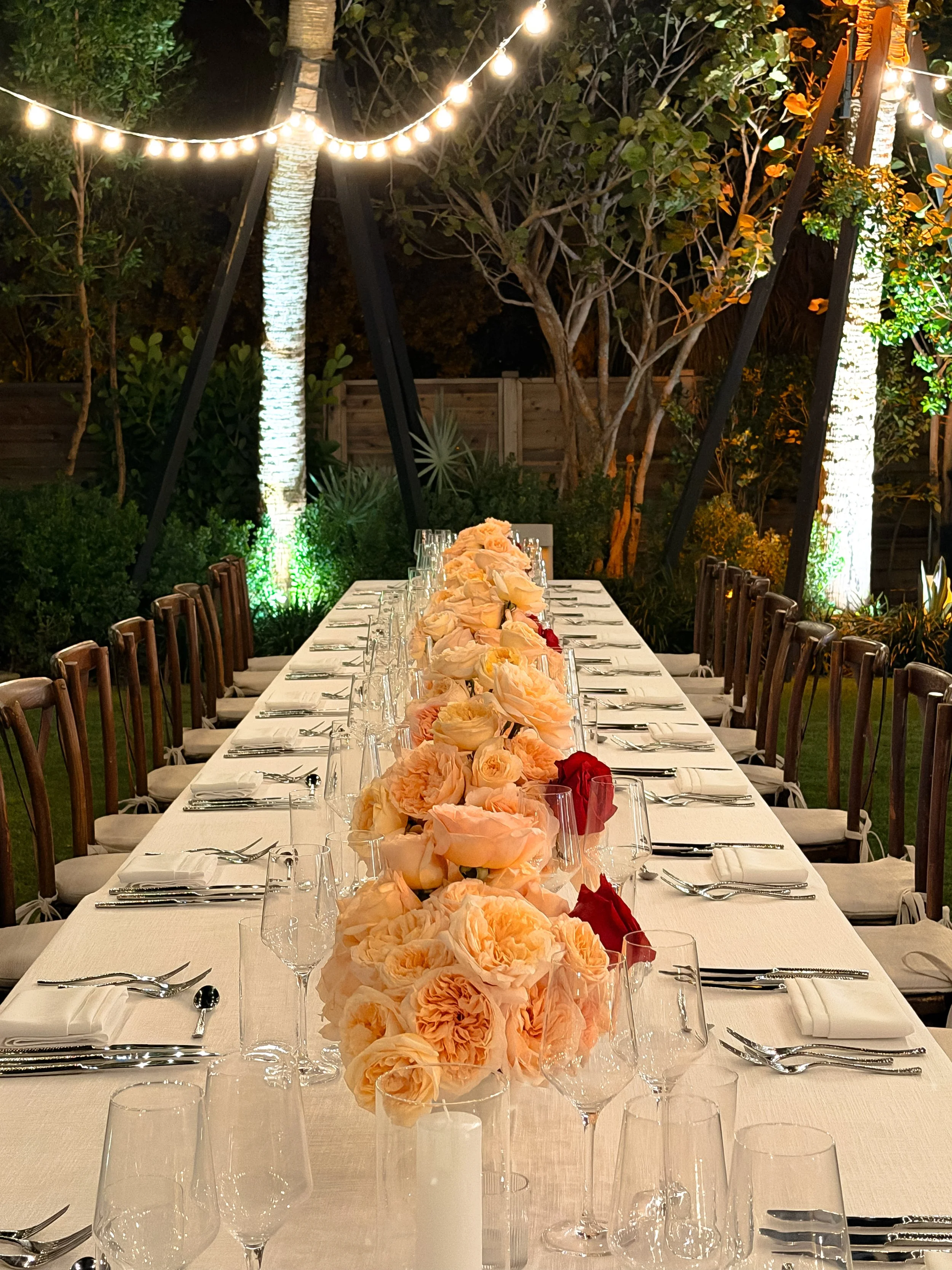 Tablescape of a dining table with florals