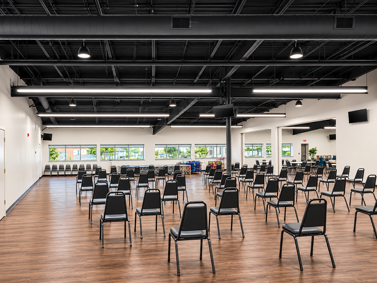 Modern Event Hall with Rows of Chairs.jpg