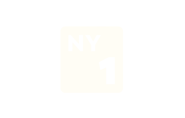 New York City subway sign with the number 1.