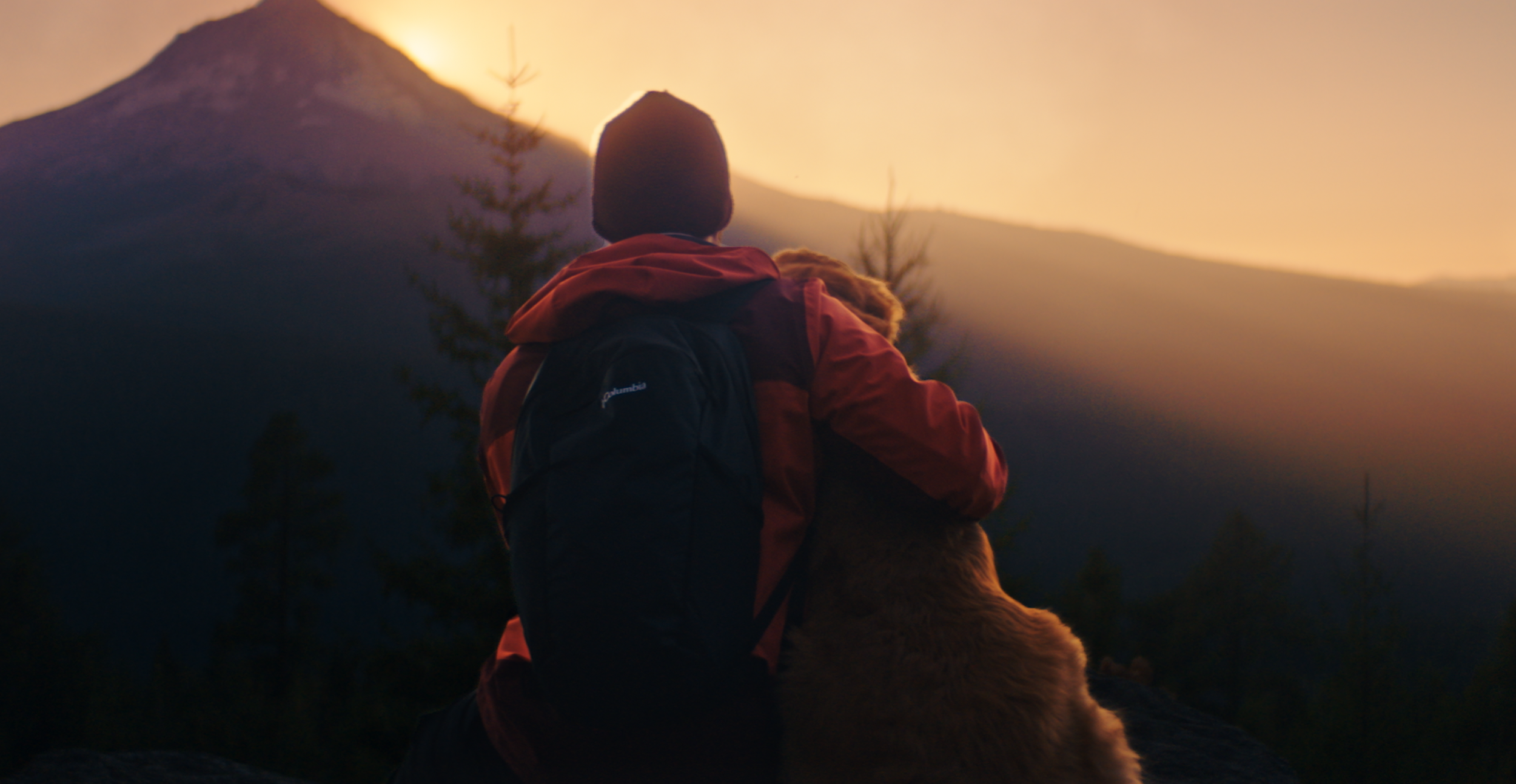 Owner and dog on an outdoor adventure in Columbia Sportswear's Trusty Soles brand film about a puppy and a pair of boots growing older together.