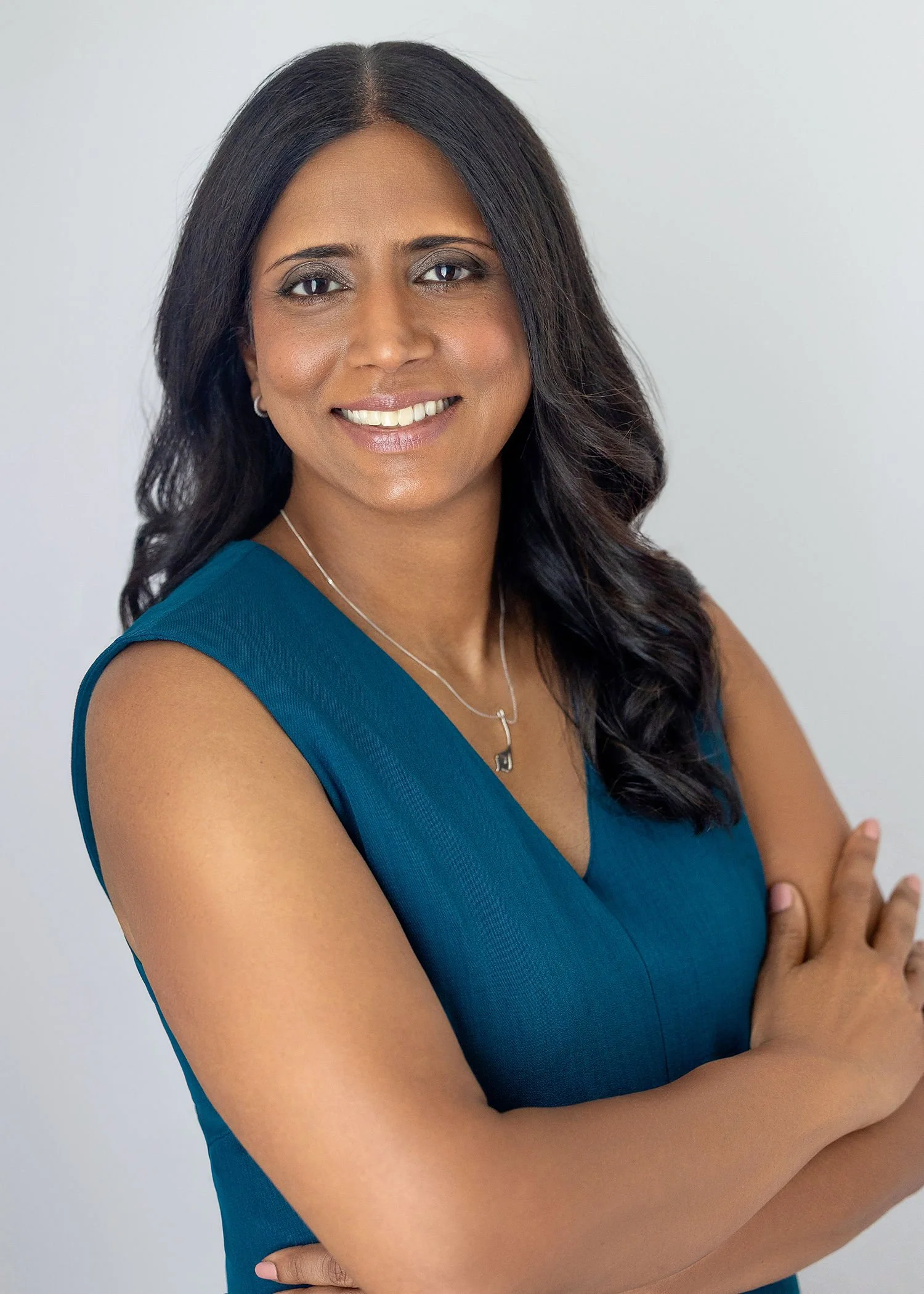 Neeraja wearing a teal blue top