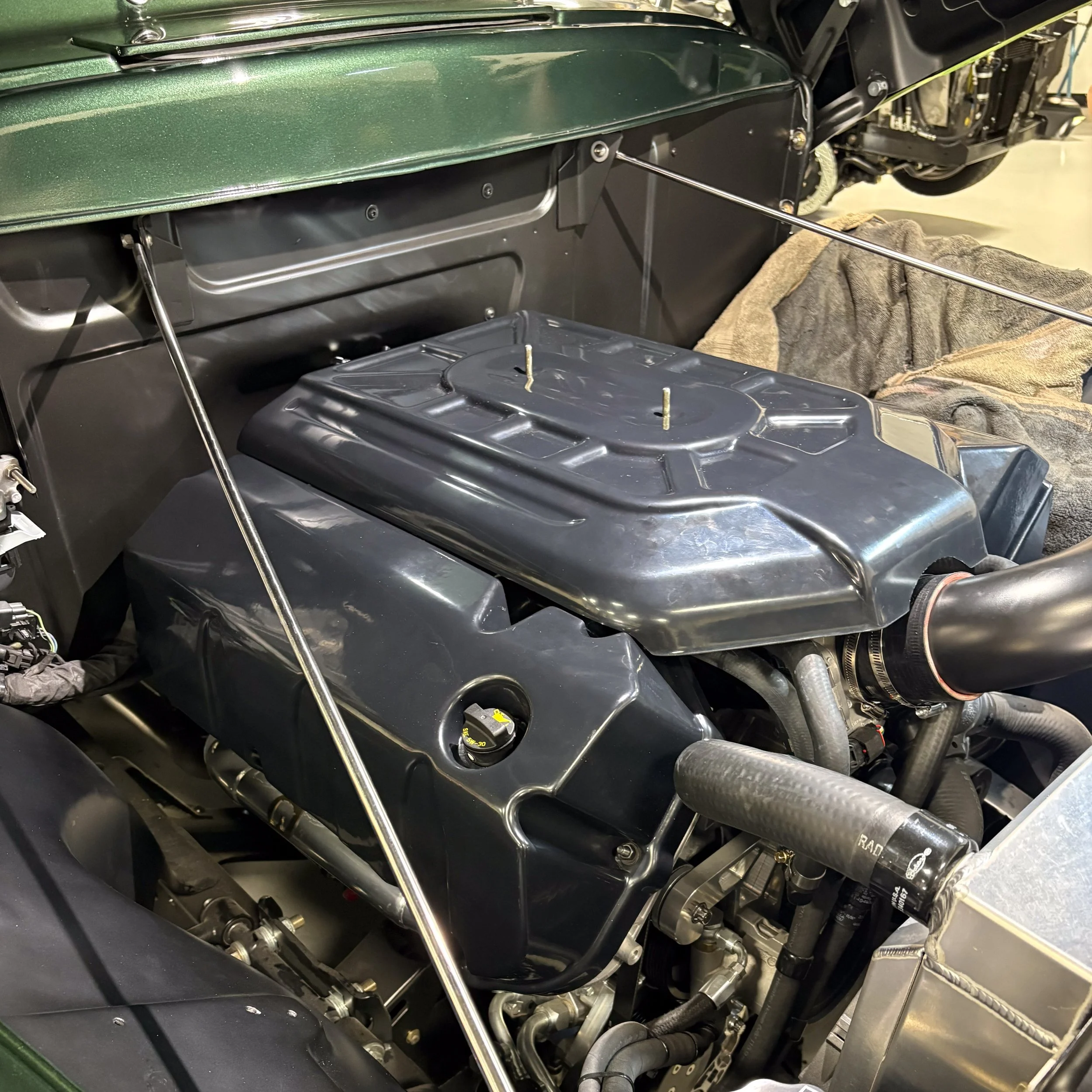 Full set of Gen 3 Coyote Engine intake & valve covers installed on 50's era Ford Panel Van