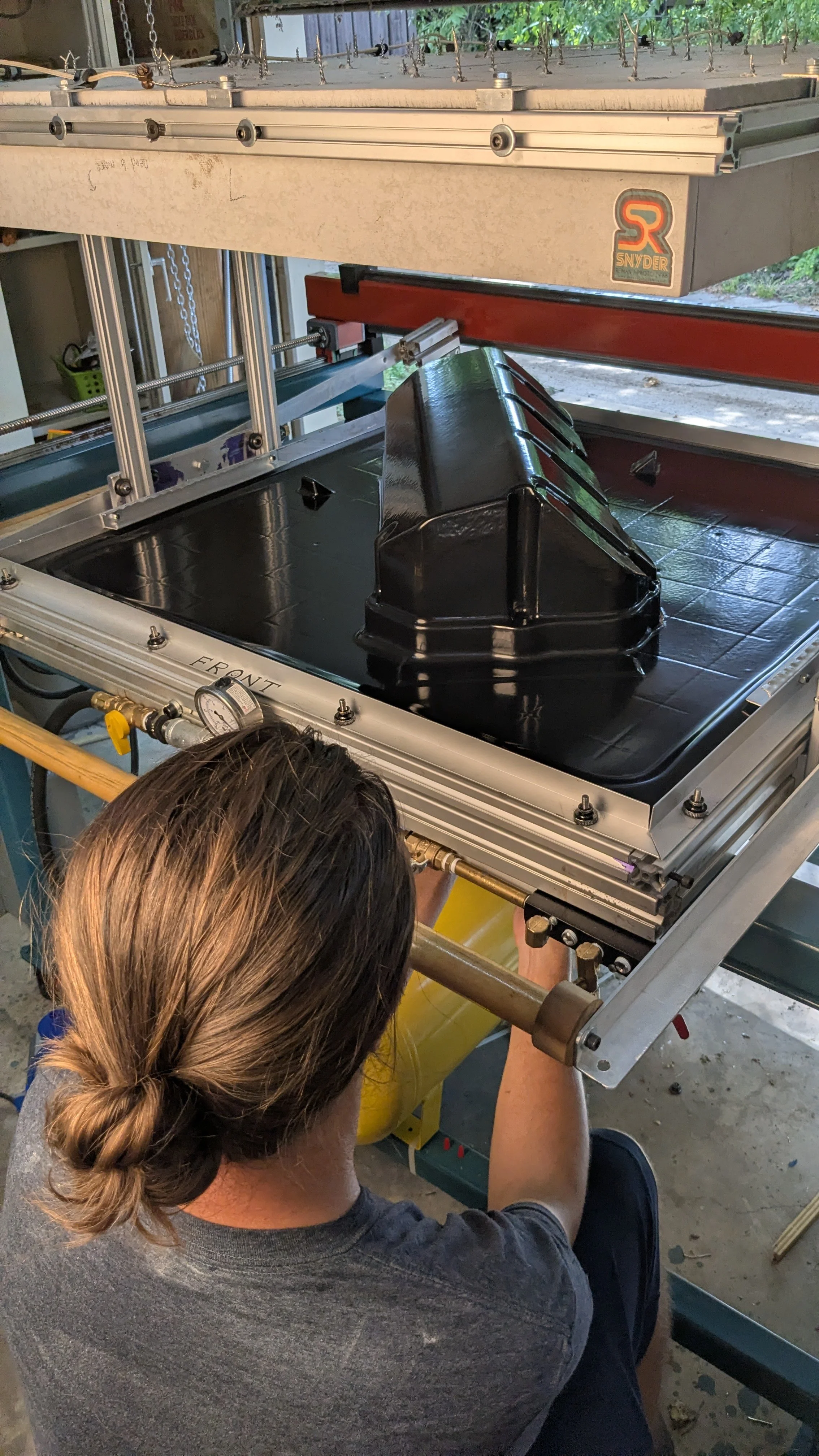 Conner pulling a thermoform of our gen 3 valve covers