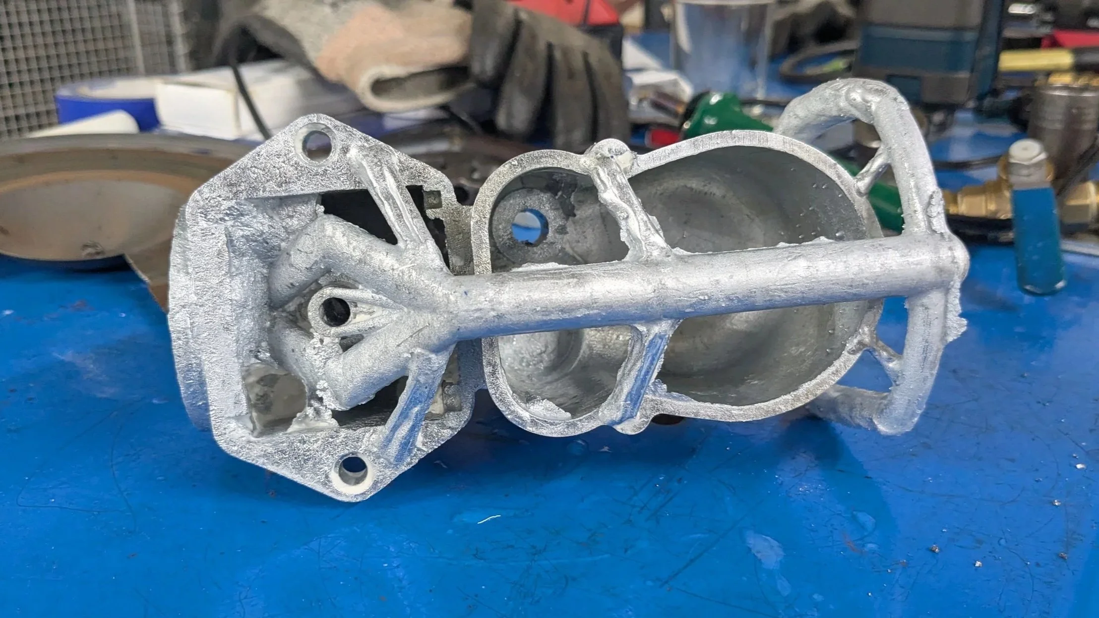 Geometric drawing of an outline square with sections divided by vertical, horizontal, and circle lines.