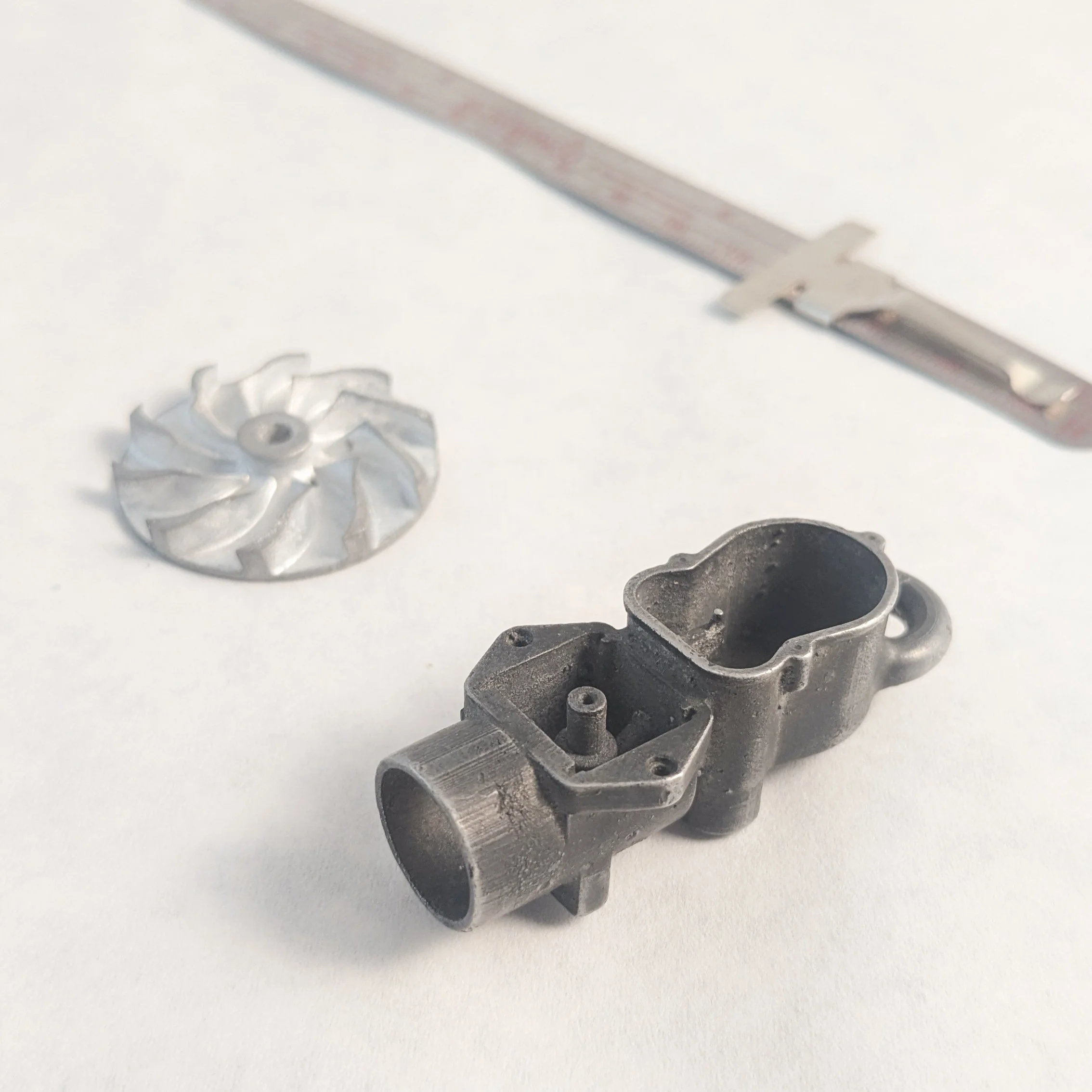 small cast metal items
