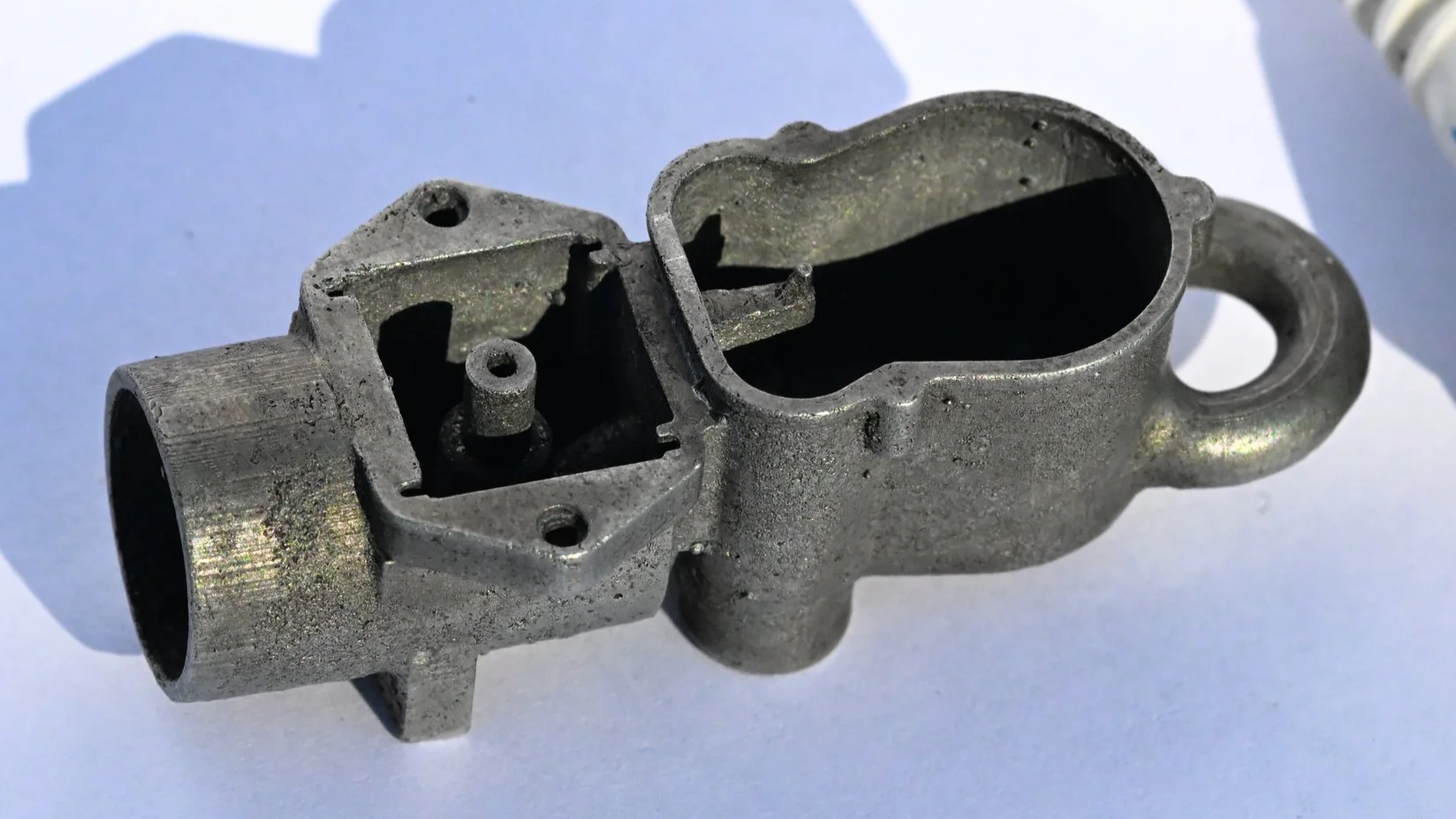 Geometric drawing of an outline square with sections divided by vertical, horizontal, and diagonal lines.