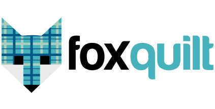 Logo of Fox Quilt featuring a stylized fox head with a plaid pattern and the words 'fox quilt' next to it.