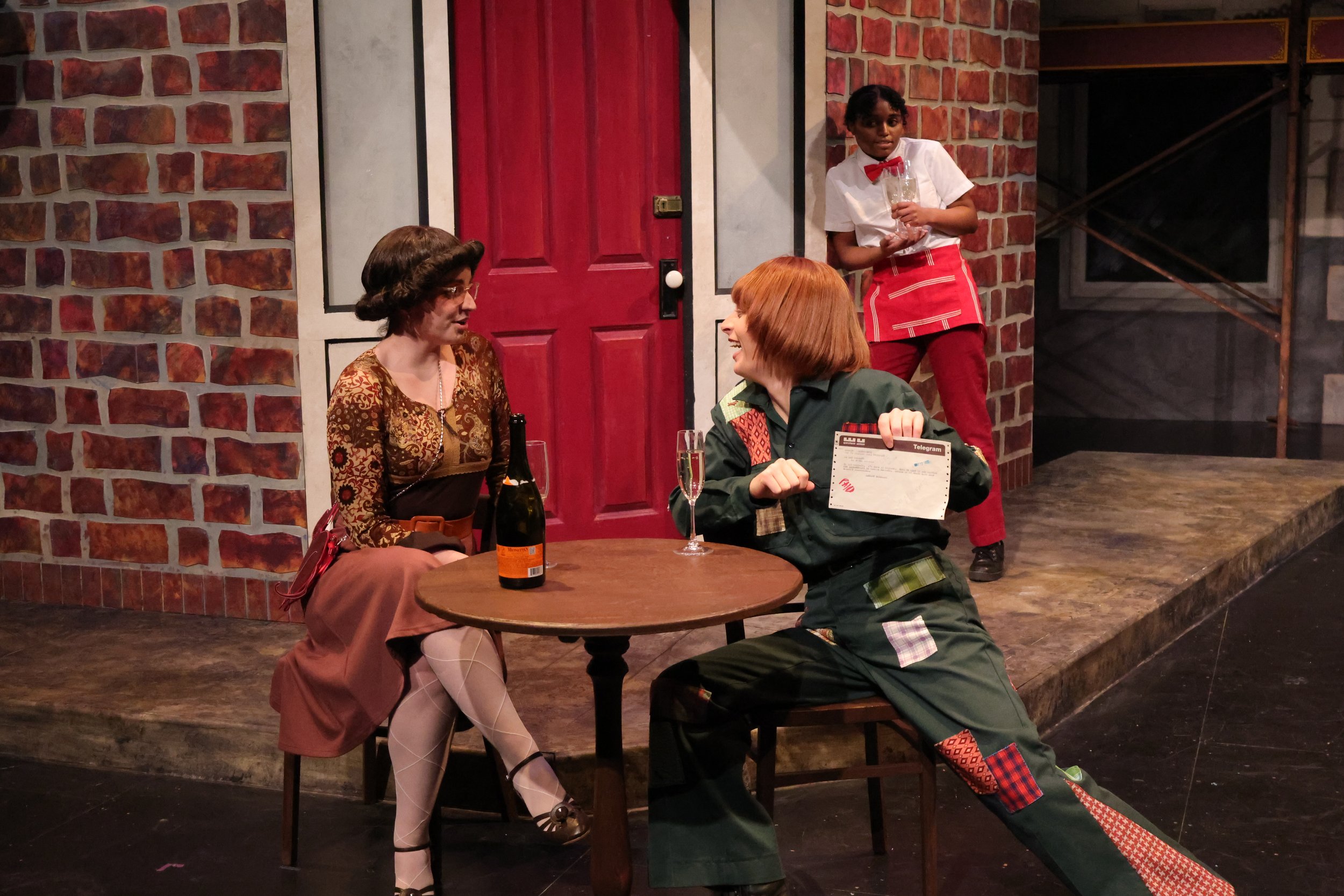 Dino Flirts with Esme, holding a telegram to Lou