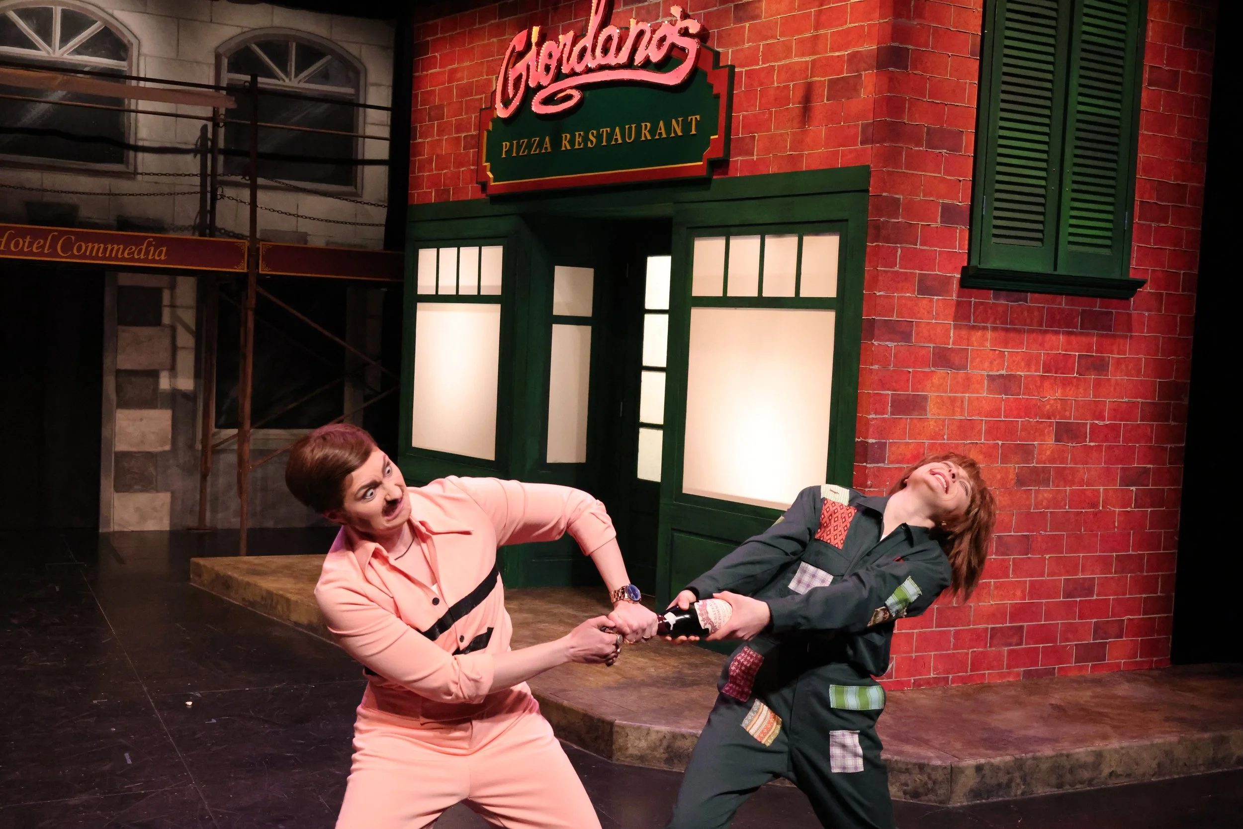 Ricky and Dino struggle to open the bottle